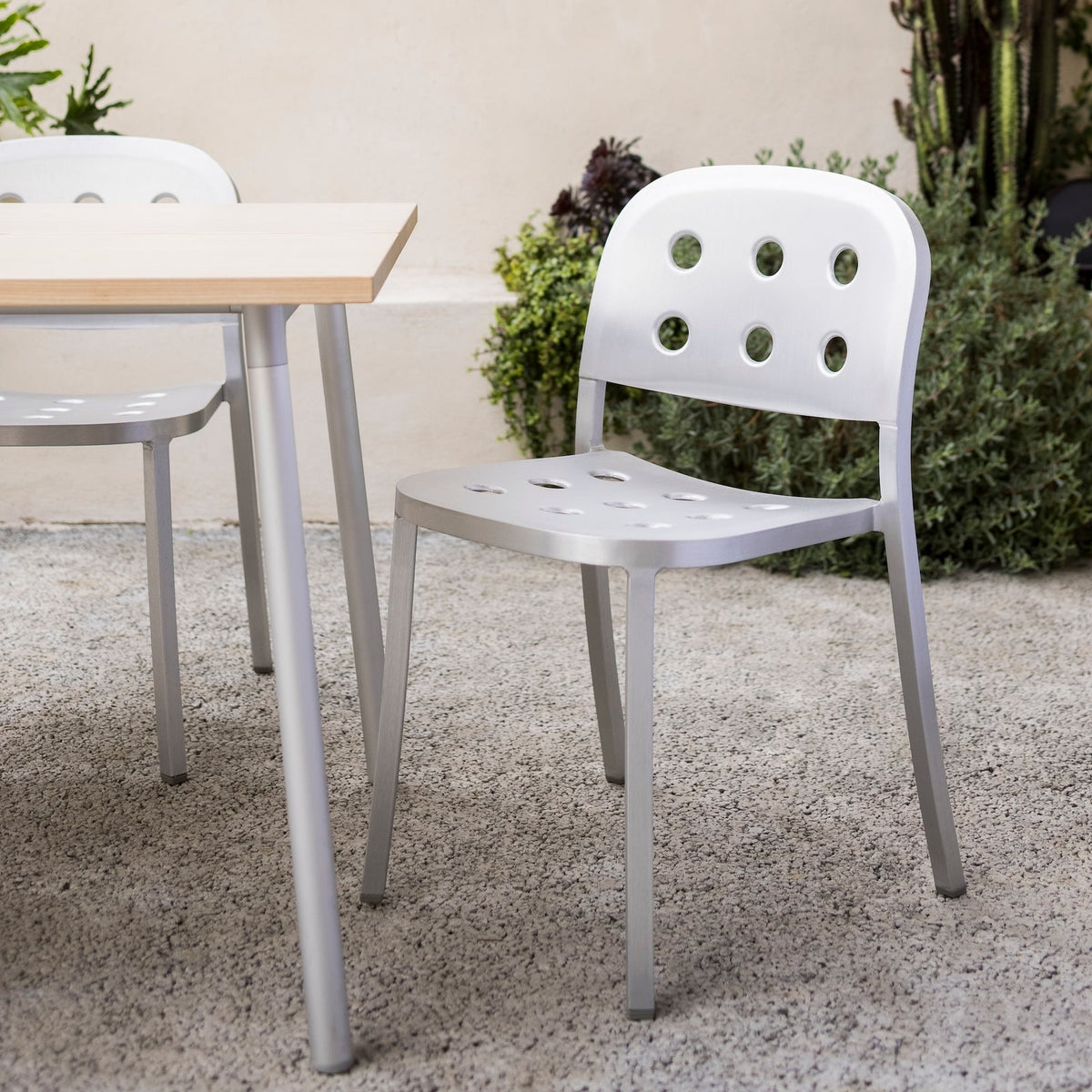 Emeco 1 Inch recycled aluminium chair outdoors, used to examine durable furniture choices for Australian exposure