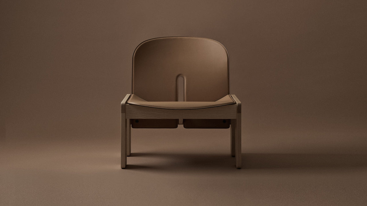 Karakter Scarpa 925 lounge chair in leather and ash, viewed from the front