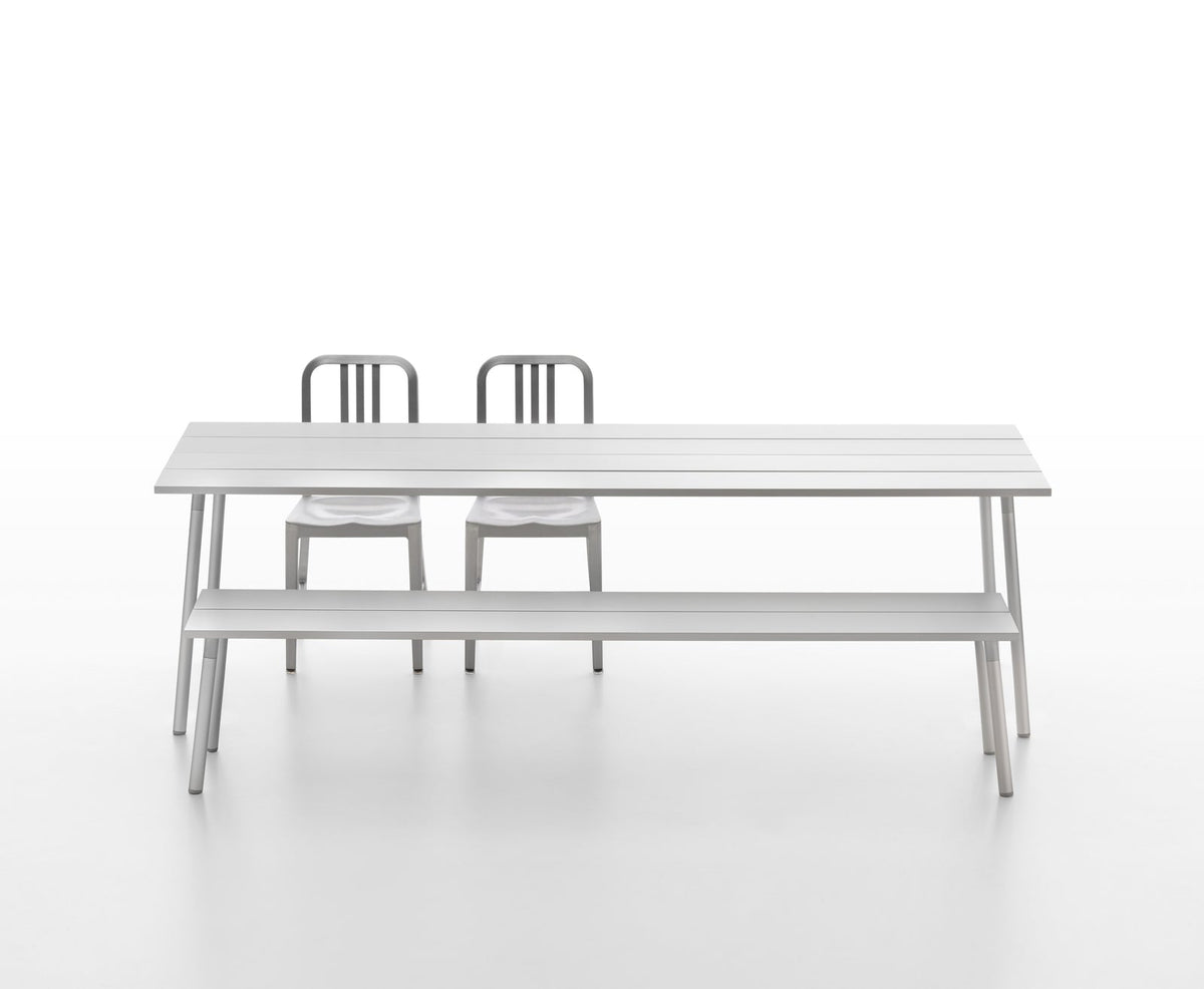 Run aluminium bench and table with two 1006 Navy Chairs — Emeco