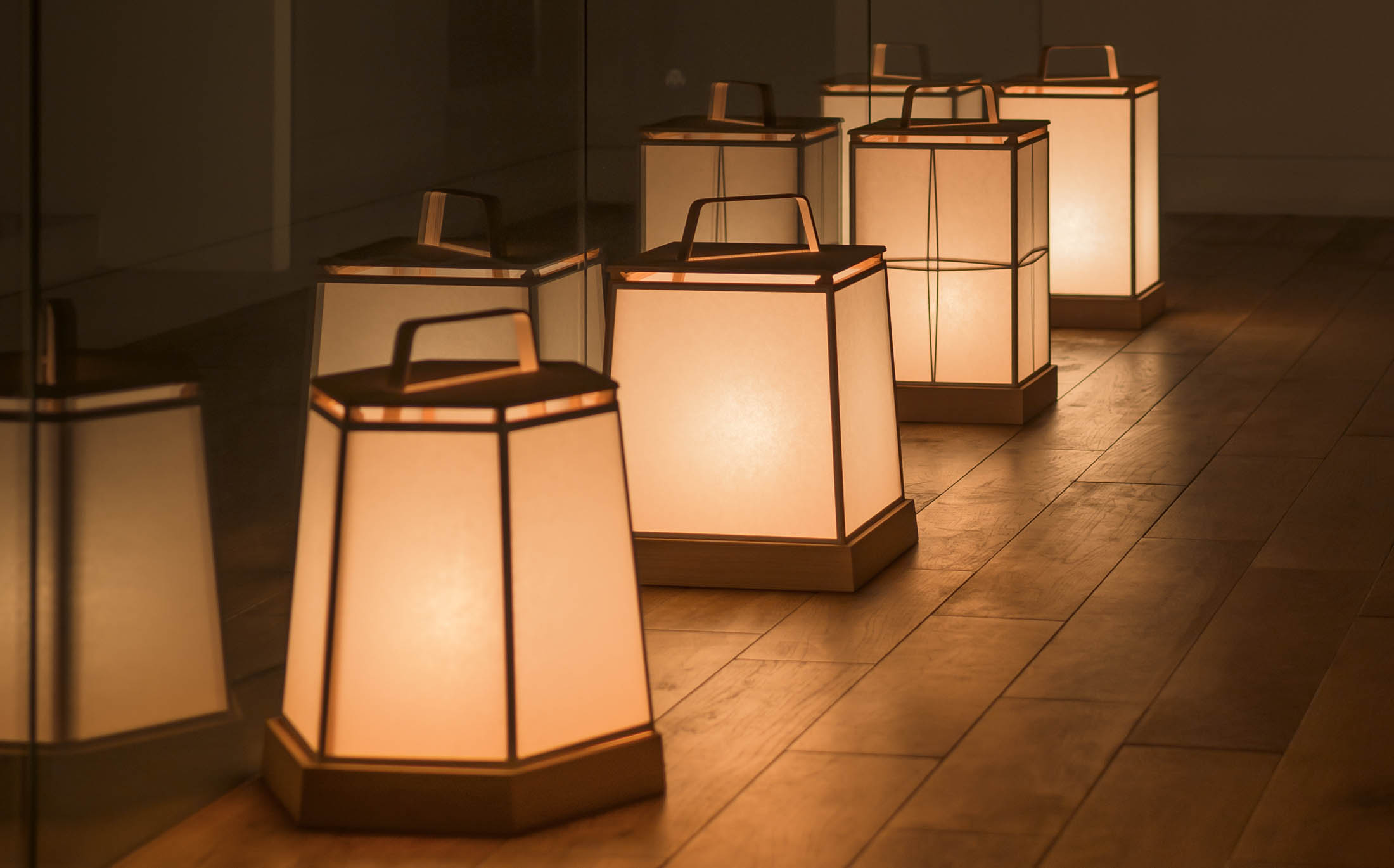 Time & Style andon 011 washi lamps glowing in a quiet timber interior