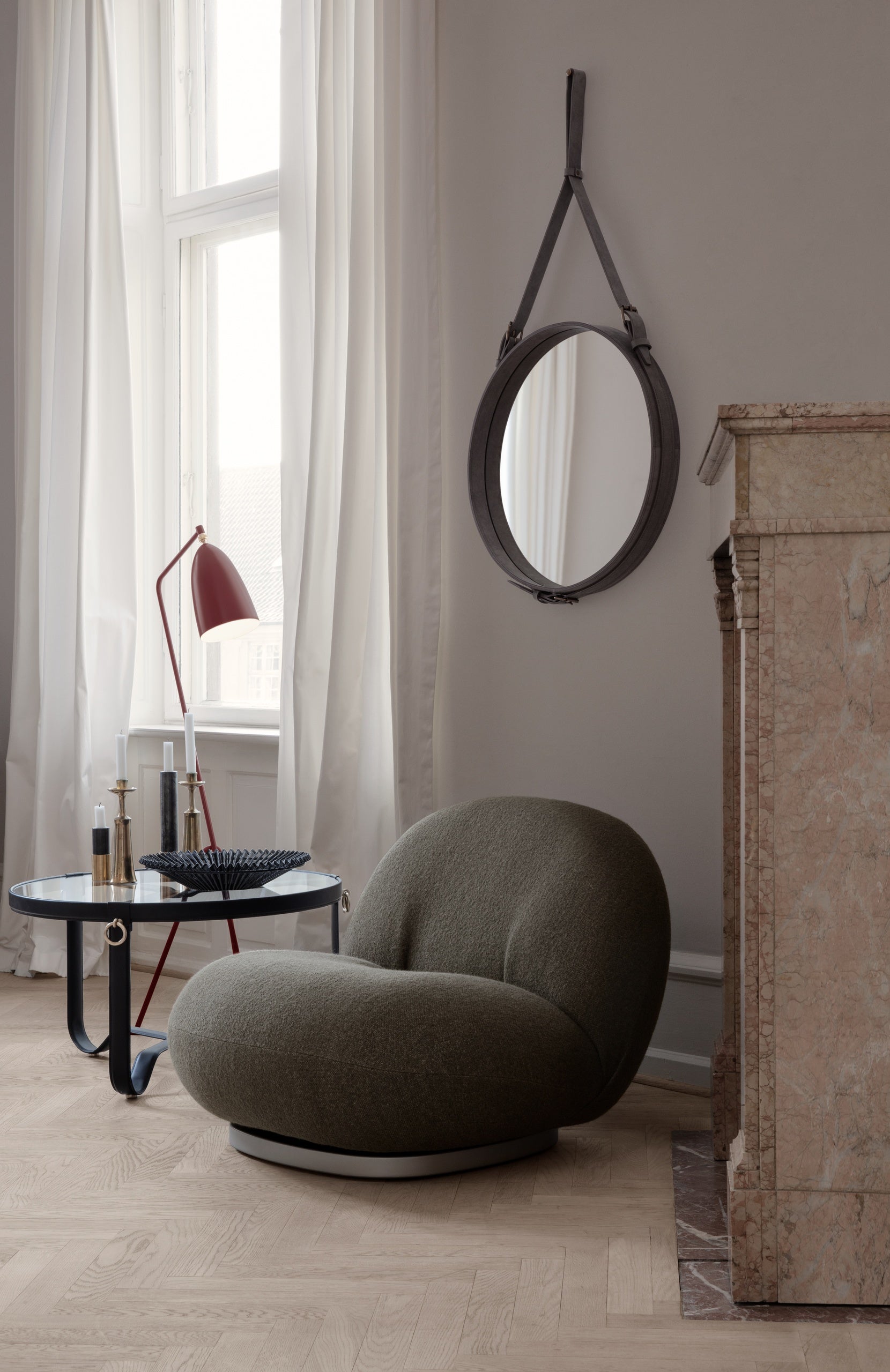 Adnet Coffee Table by GUBI shown in an interior setting
