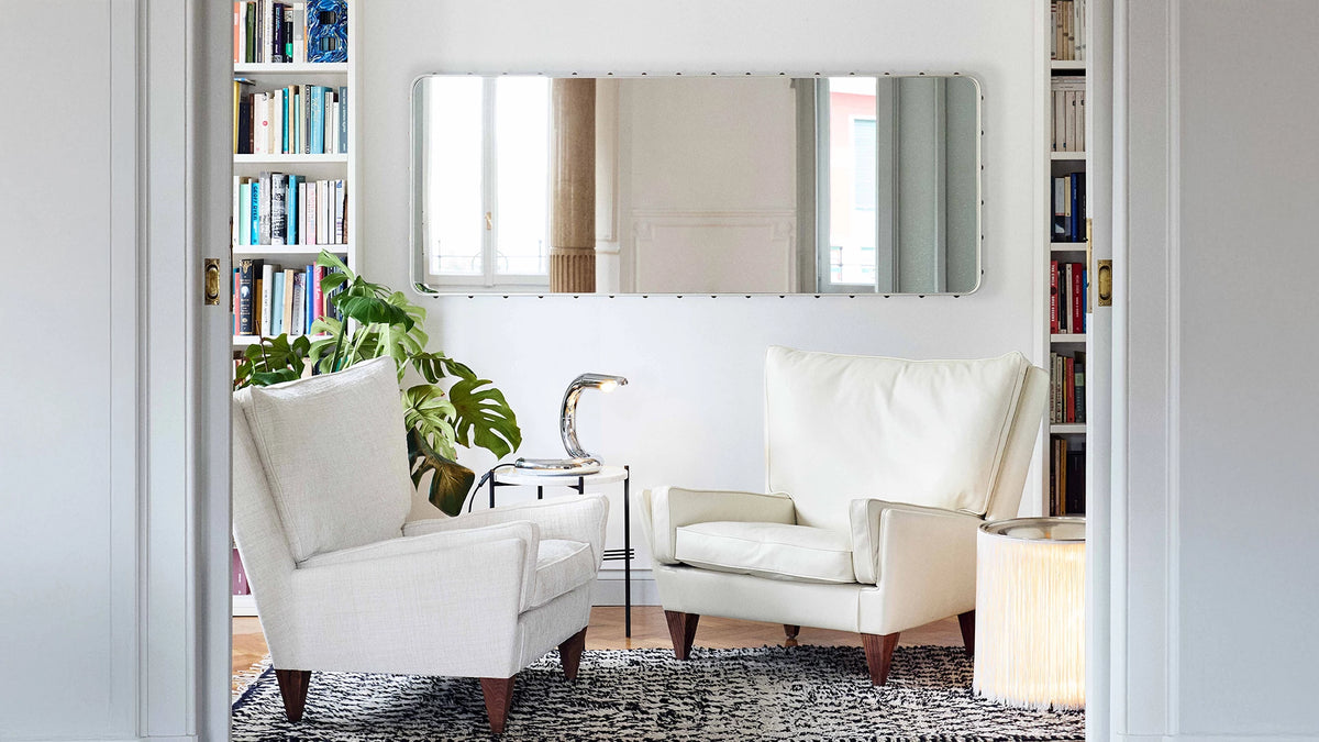 Adnet Wall Mirror Rectangular by GUBI shown in an interior setting