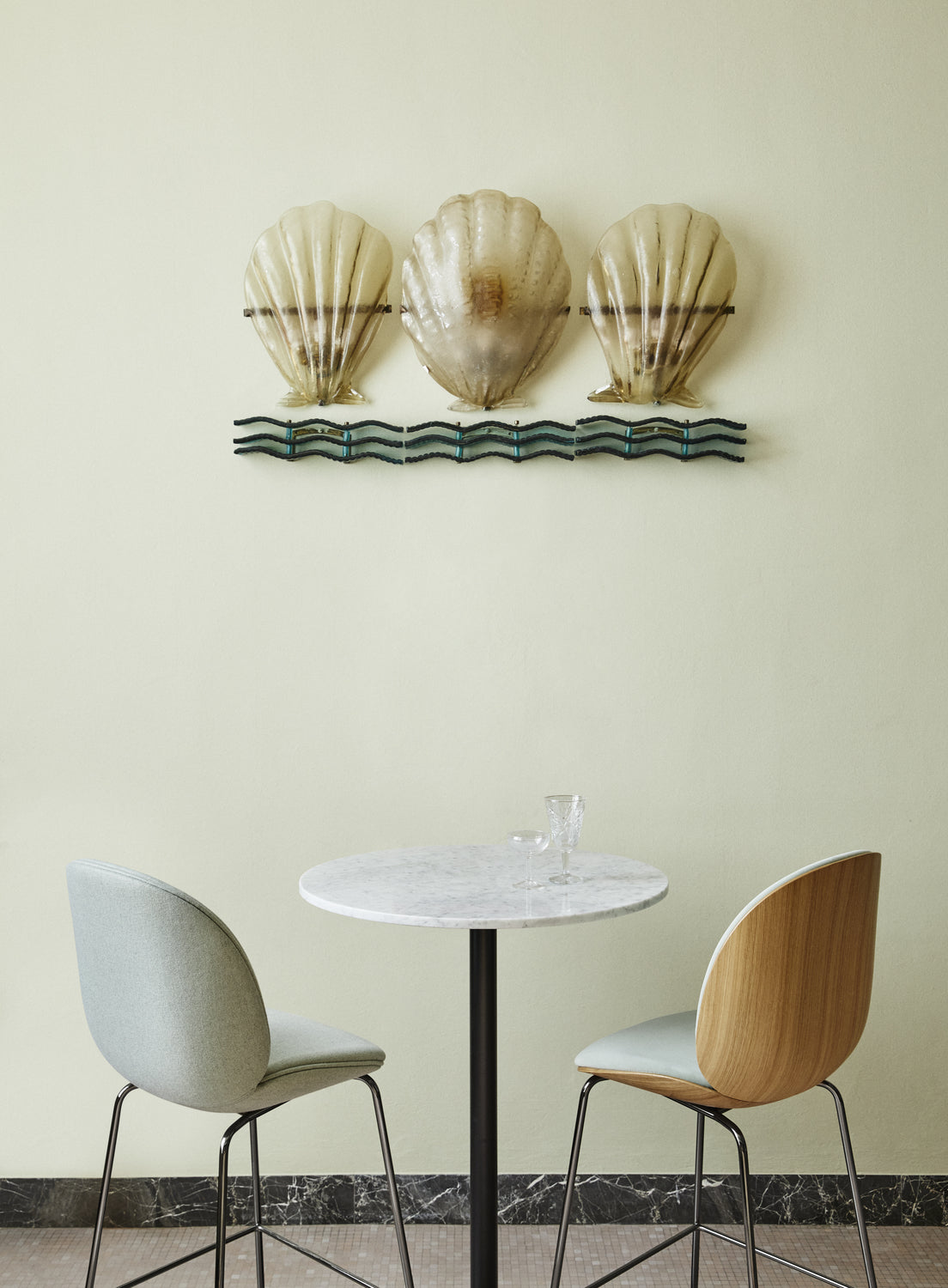 Beetle Bar Chair by GUBI shown in an interior setting