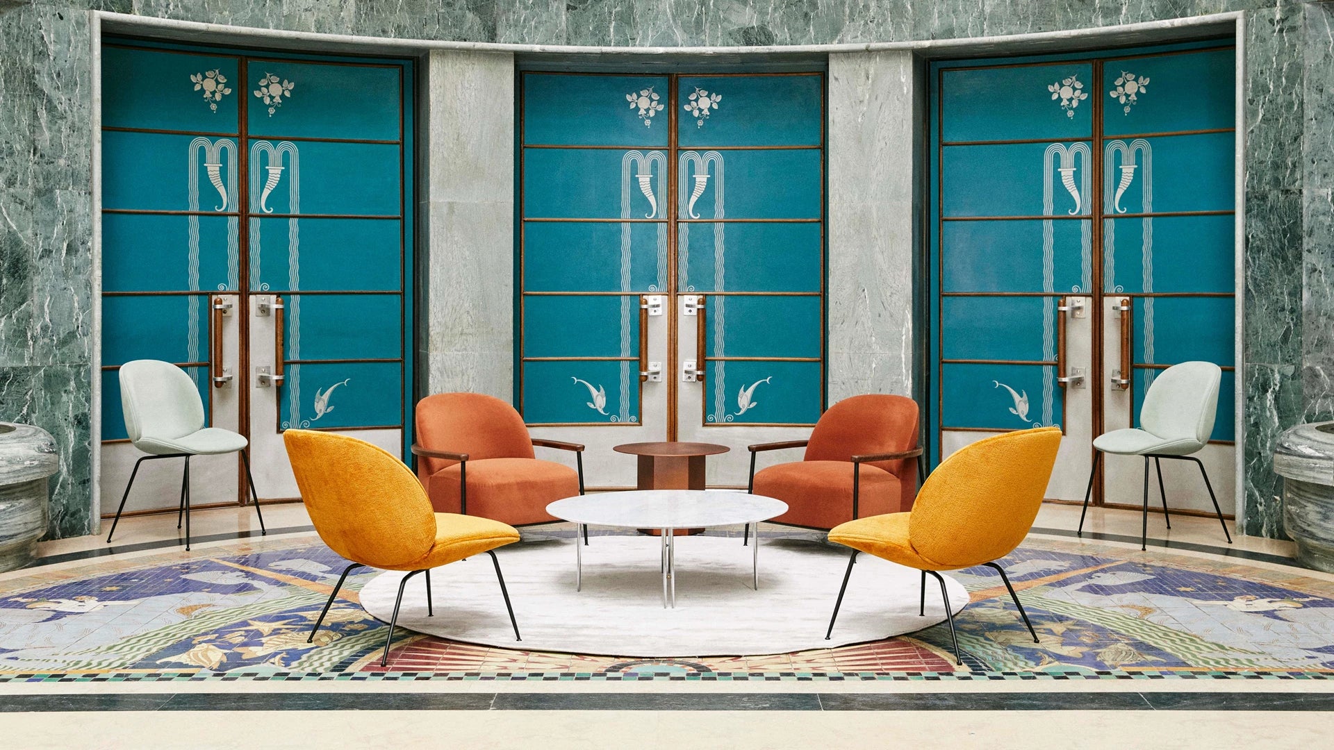 Beetle Lounge Chair by GUBI shown in an interior setting, view 1