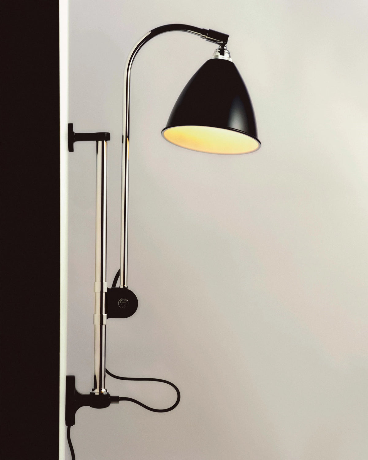 BL5 Wall Lamp by GUBI shown in an interior setting