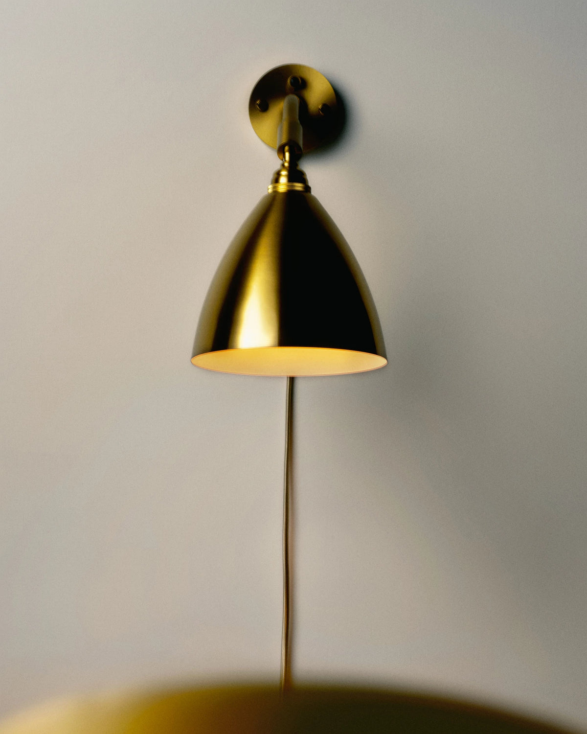 BL7 Wall Lamp by GUBI shown in an interior setting, view 2