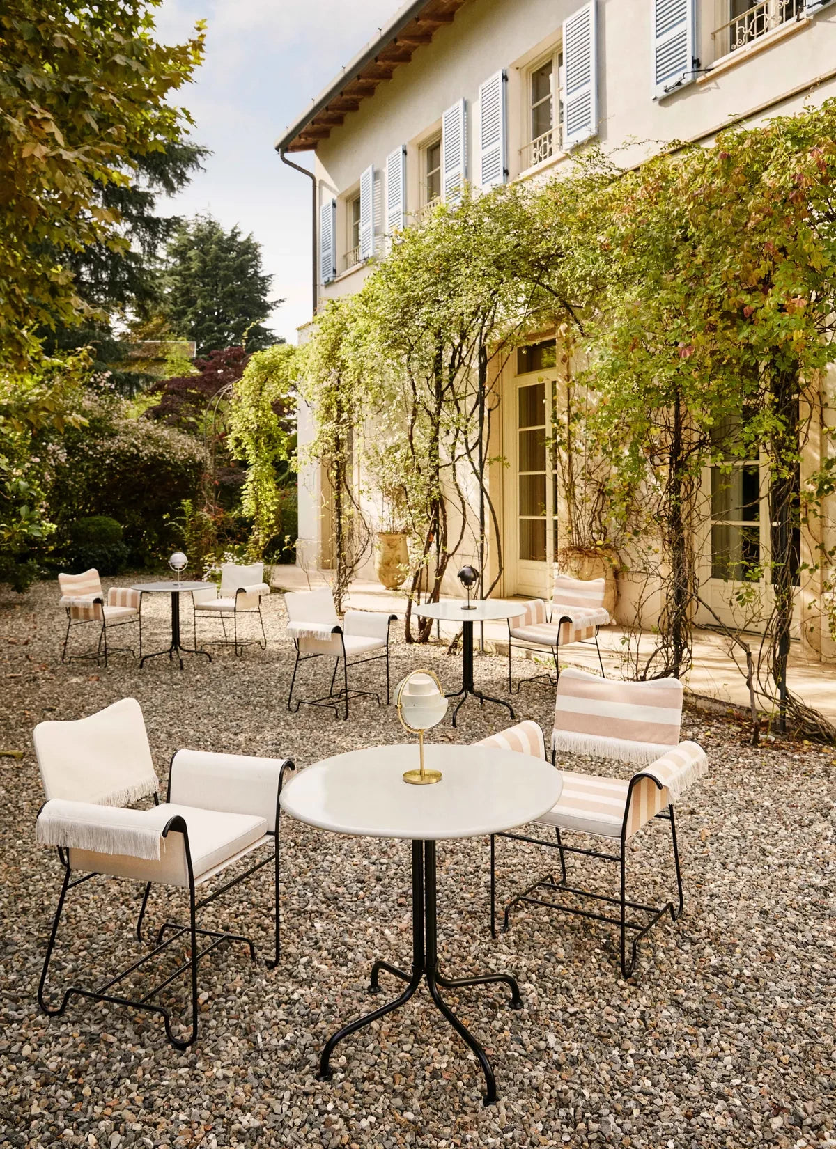 Carmel Bistro Dining Table by GUBI shown in an interior setting, view 2