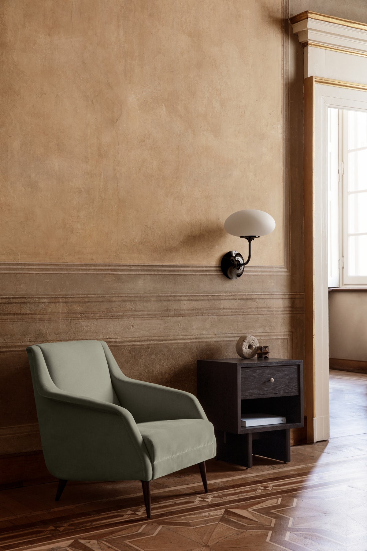 CDC.1 Lounge Chair by GUBI shown in an interior setting