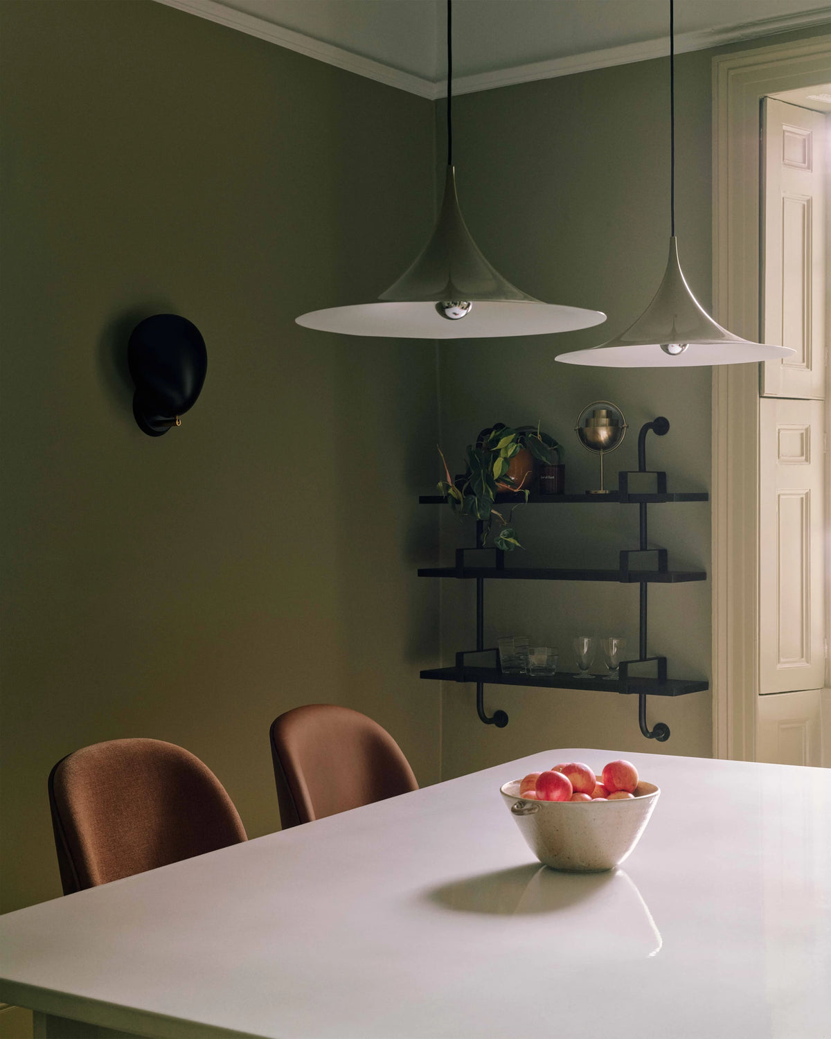 Cobra Wall Lamp by GUBI shown in an interior setting, view 3