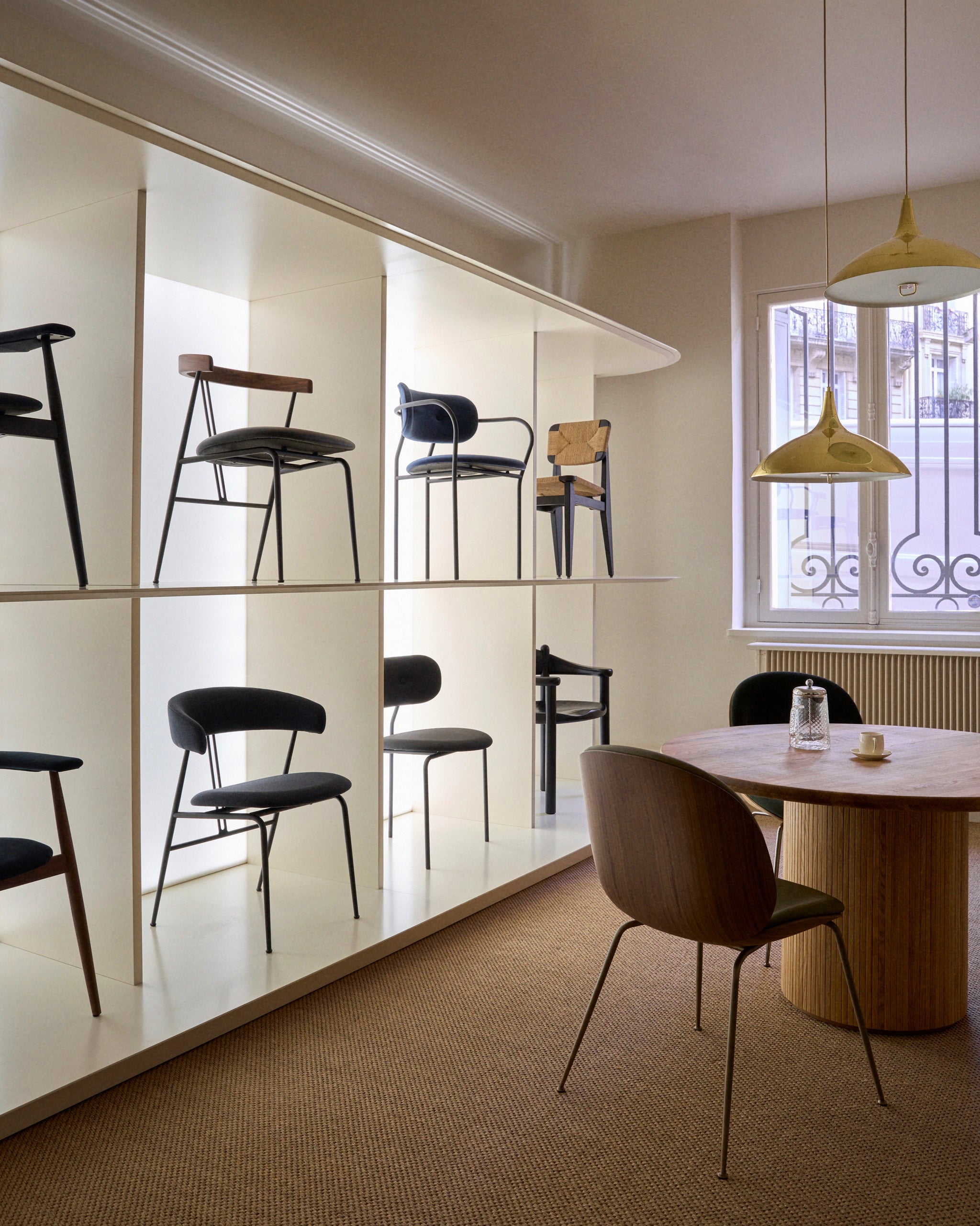 Coco Dining Armchair by GUBI shown in an interior setting