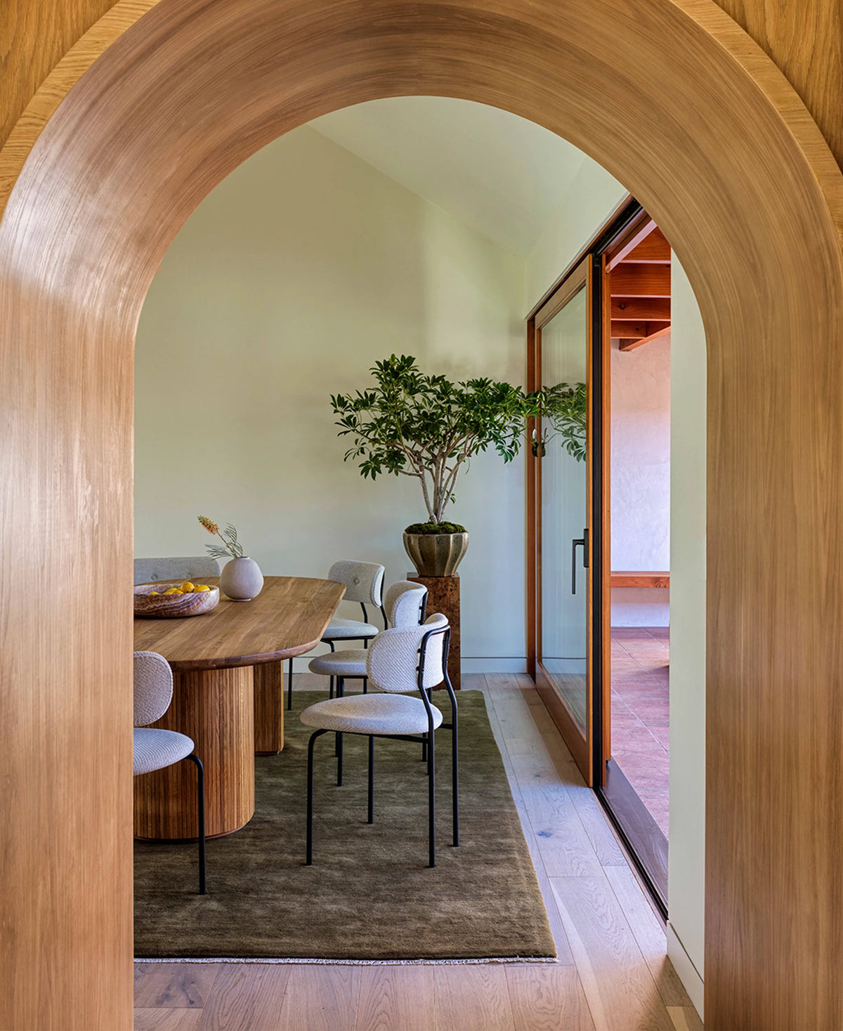 Coco Dining Chair by GUBI shown in an interior setting, view 2