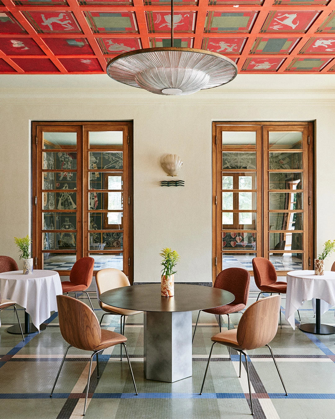 Epic Dining Table, Round by GUBI shown in an interior setting, view 2
