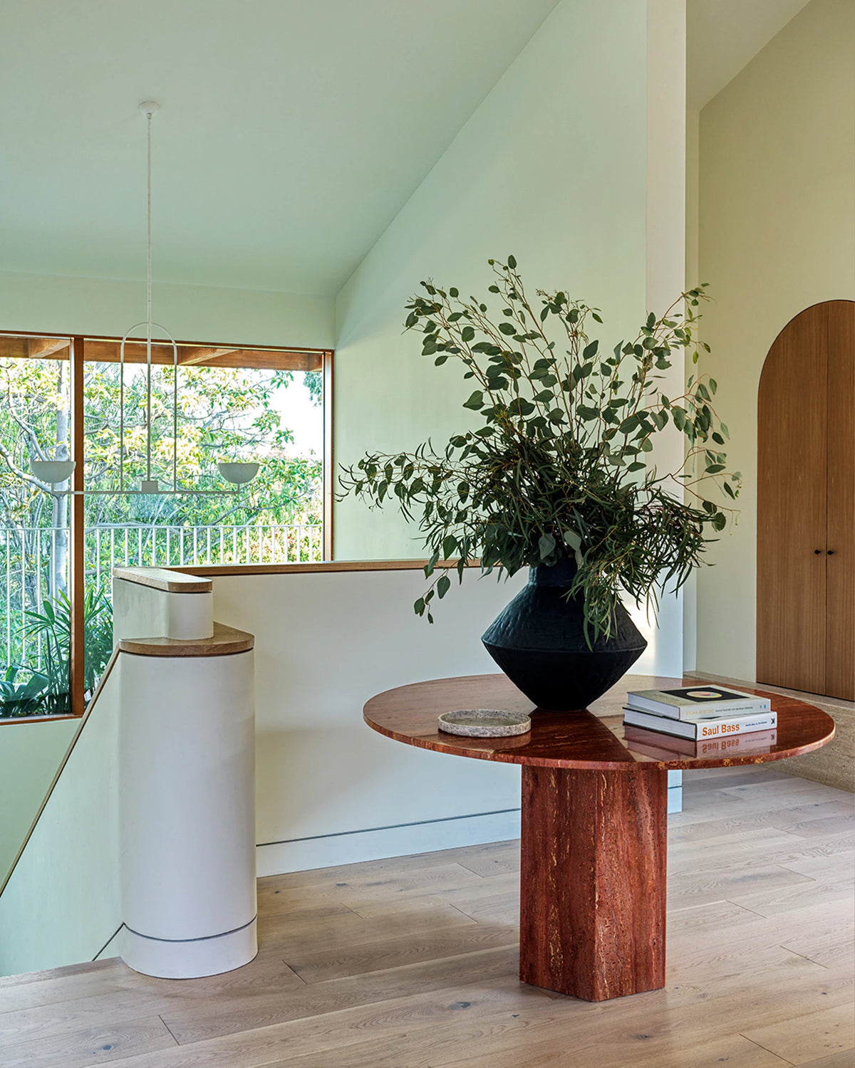 Epic Dining Table, Round by GUBI shown in an interior setting, view 4