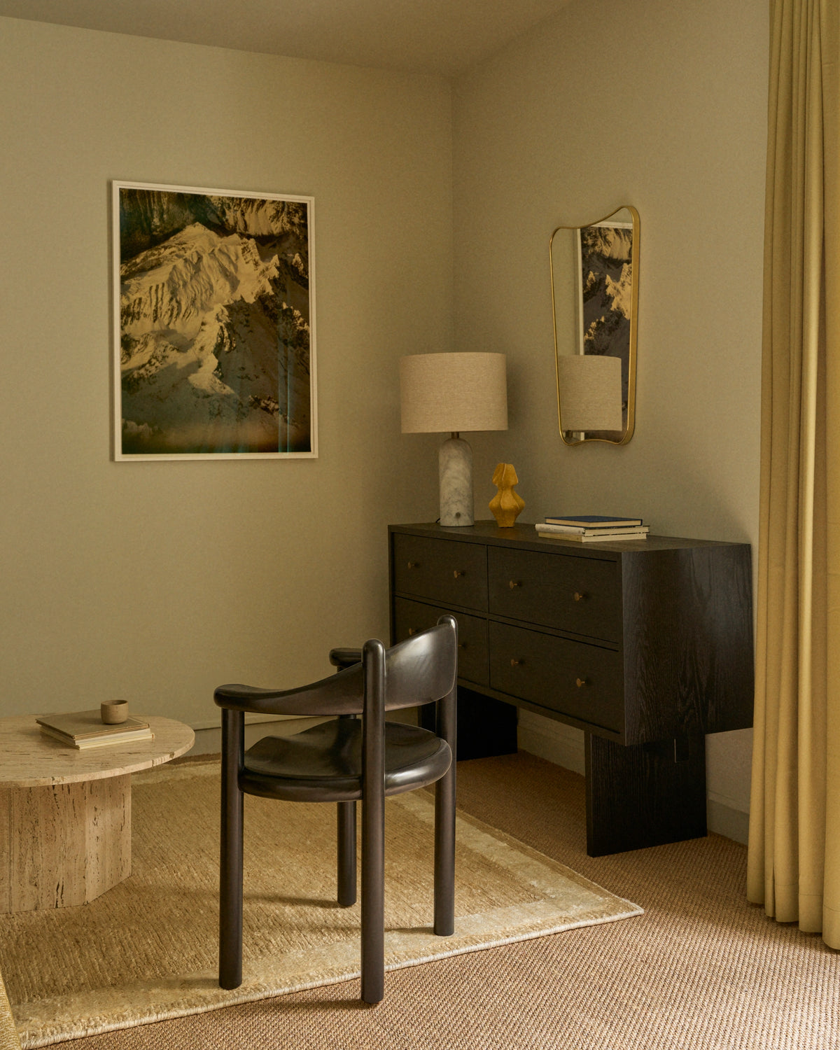 F.A.33 Wall Mirror by GUBI shown in an interior setting