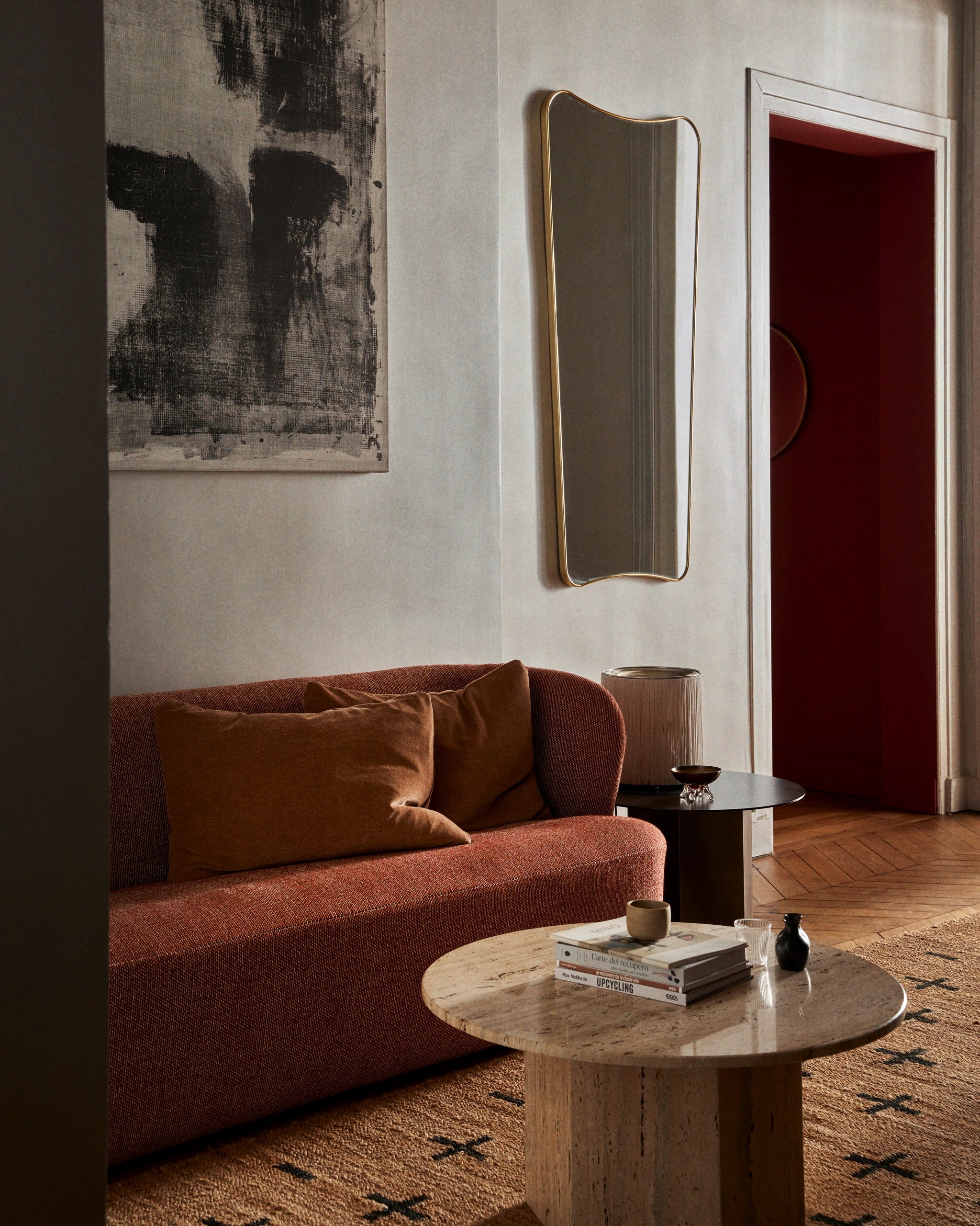 F.A.33 Wall Mirror by GUBI shown in an interior setting