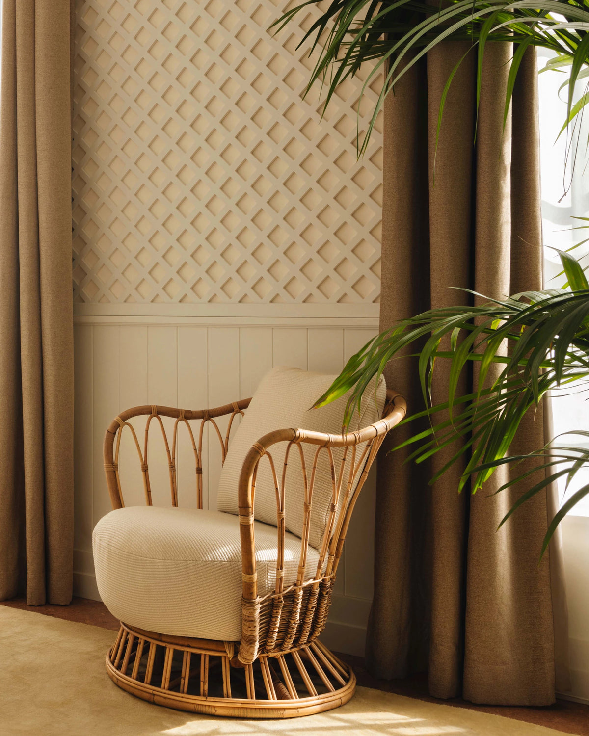 Grace Lounge Chair by GUBI shown in an interior setting, view 2