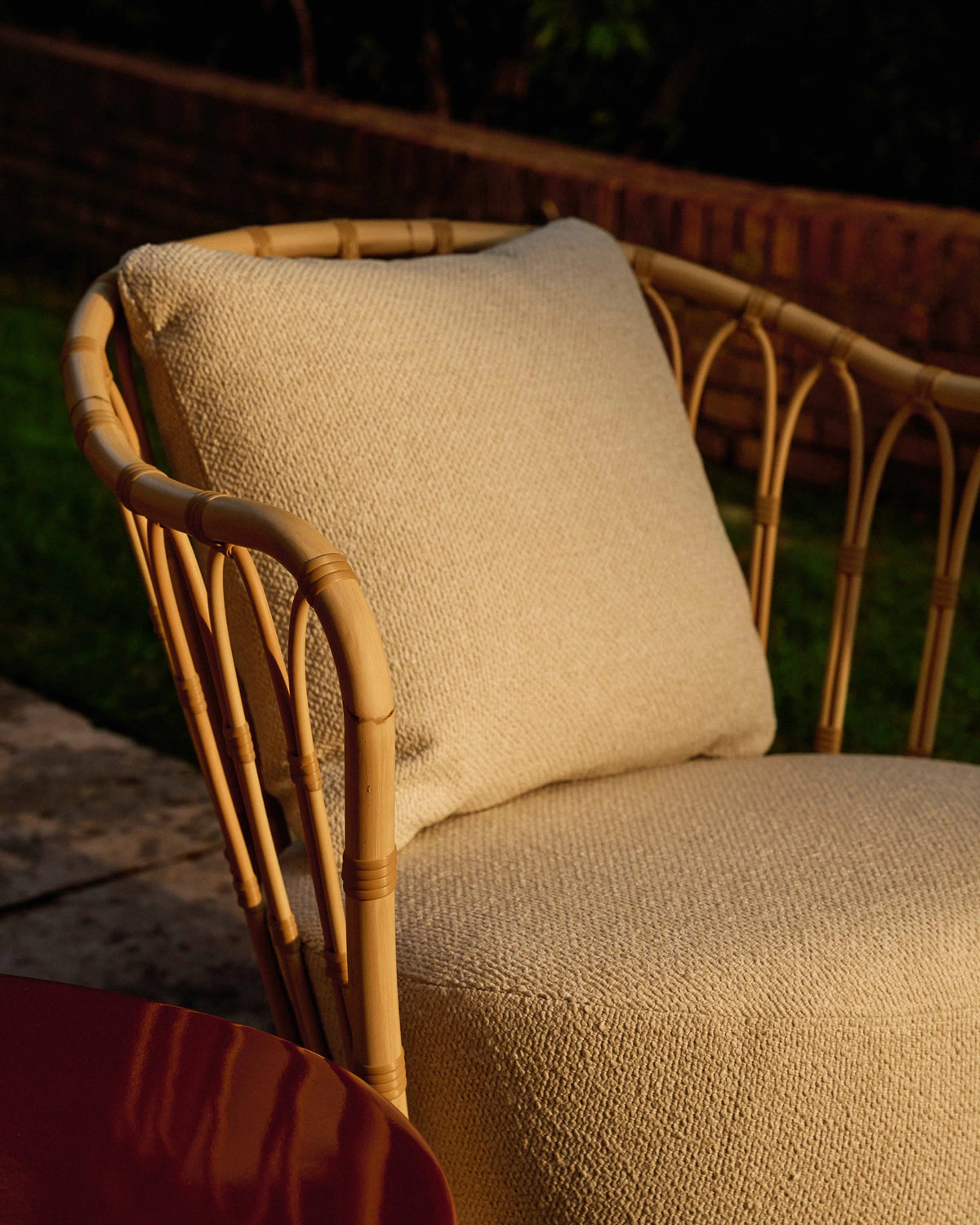 Grace Outdoor Lounge Chair by GUBI shown in an interior setting