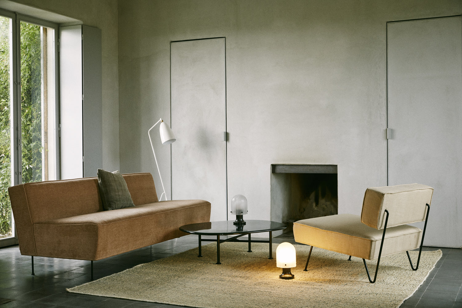 GrÃ¤shoppa Floor Lamp by GUBI shown in an interior setting