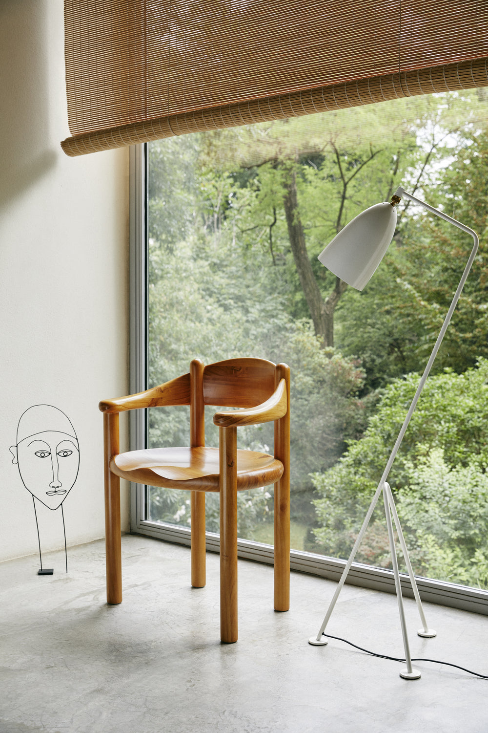 GrÃ¤shoppa Floor Lamp by GUBI shown in an interior setting