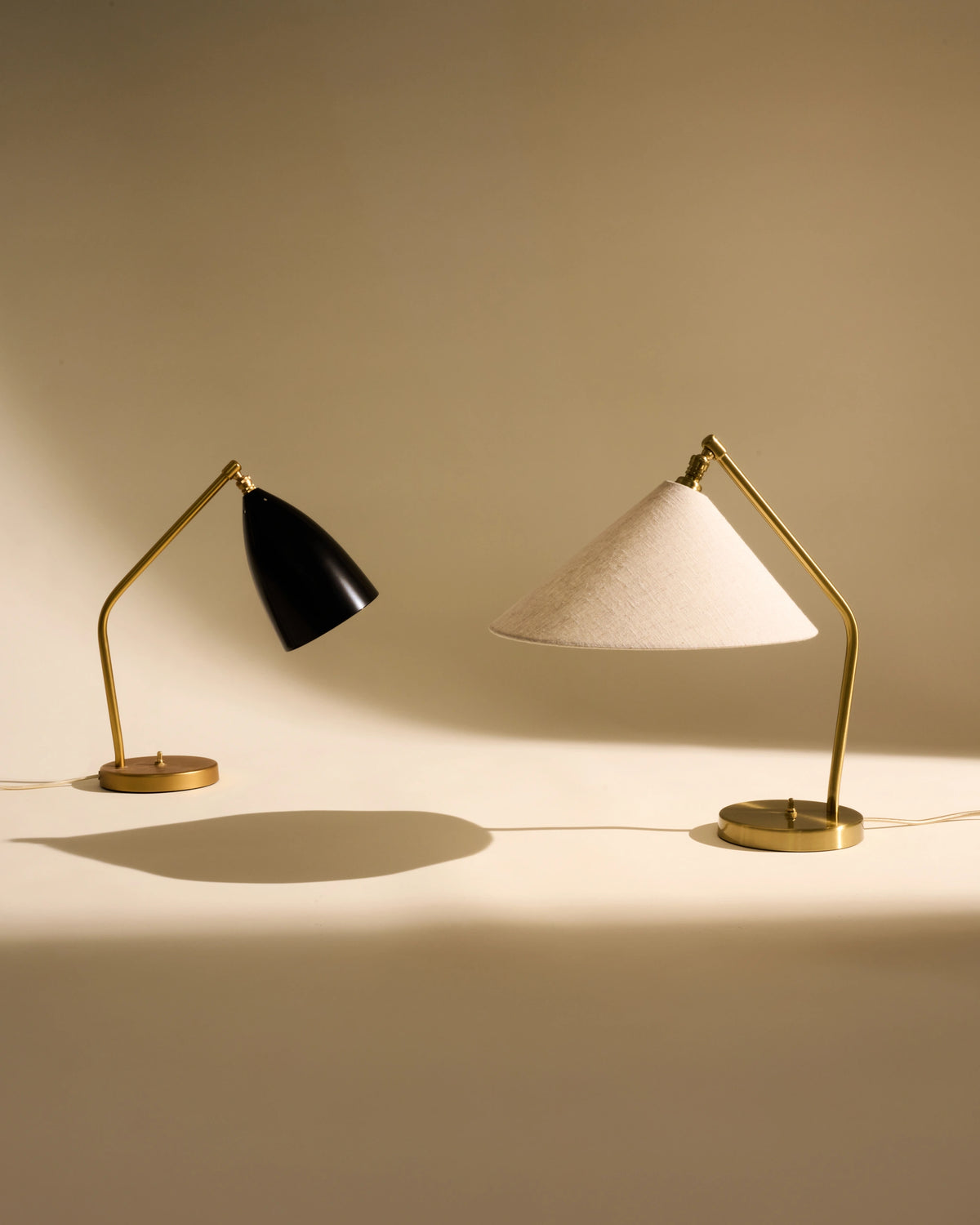 Gräshoppa Table Lamp by GUBI shown in an interior setting