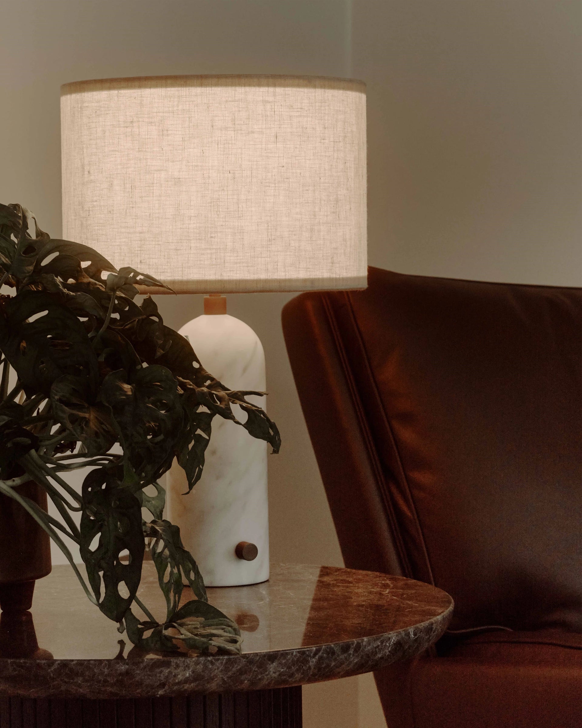 Gravity Table Lamp by GUBI shown in an interior setting, view 4