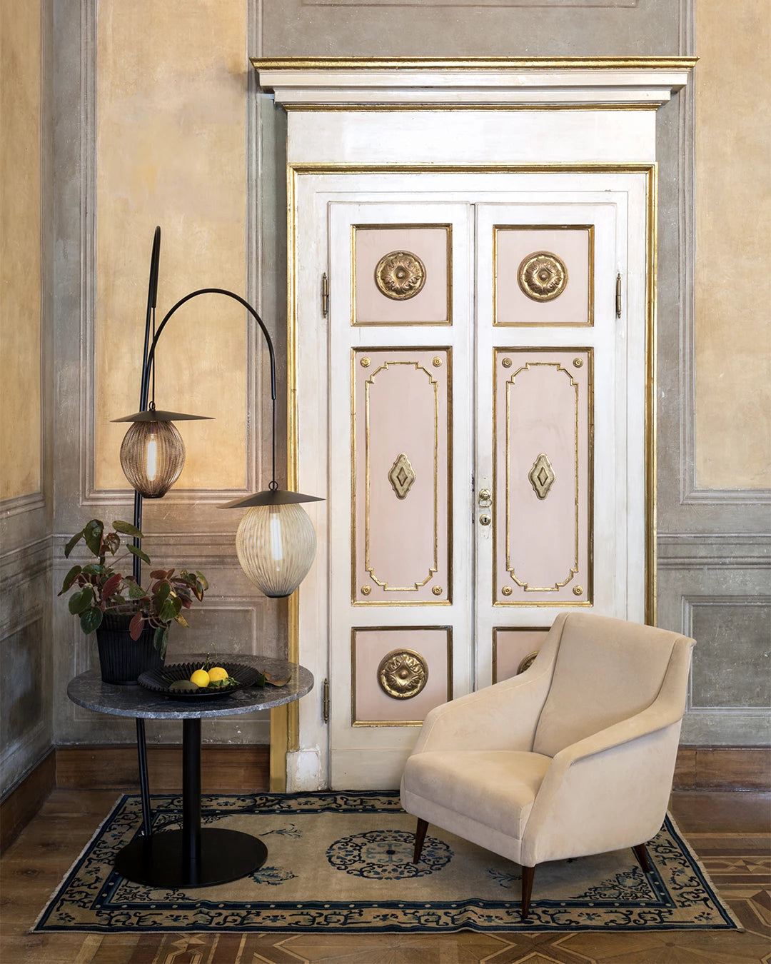 GUBI 1.0 Lounge Table - Round by GUBI shown in an interior setting, view 2