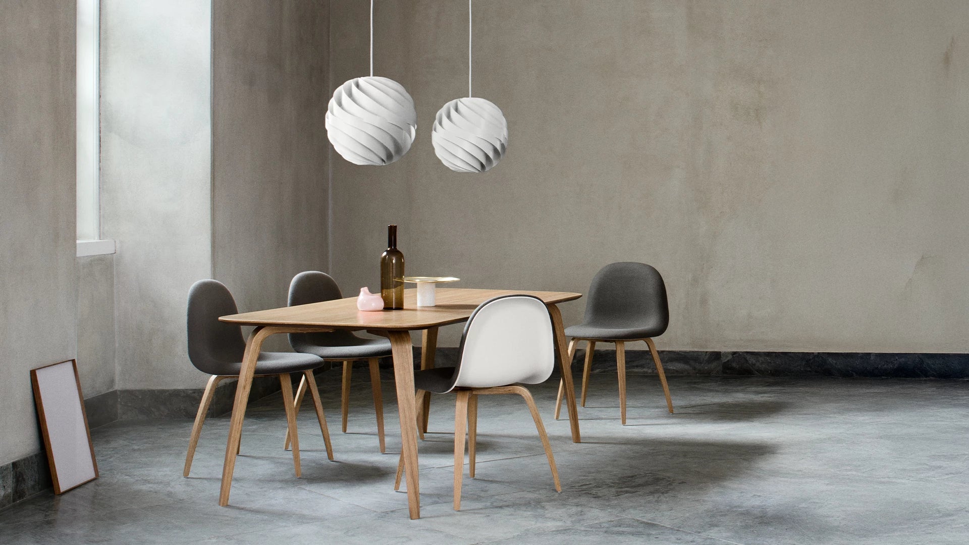 GUBI Dining Table by GUBI shown in an interior setting