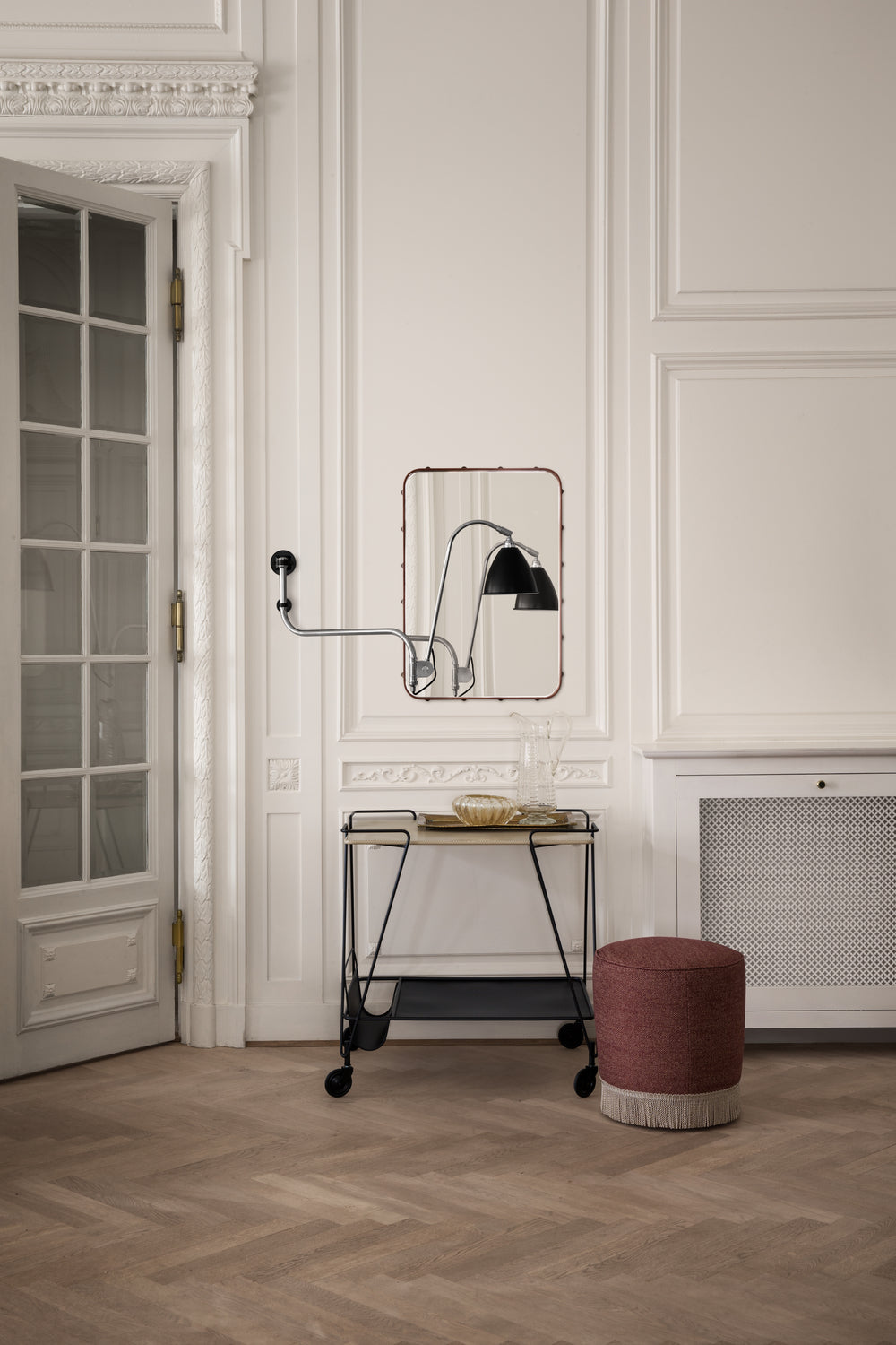 GUBI Pouffe by GUBI shown in an interior setting