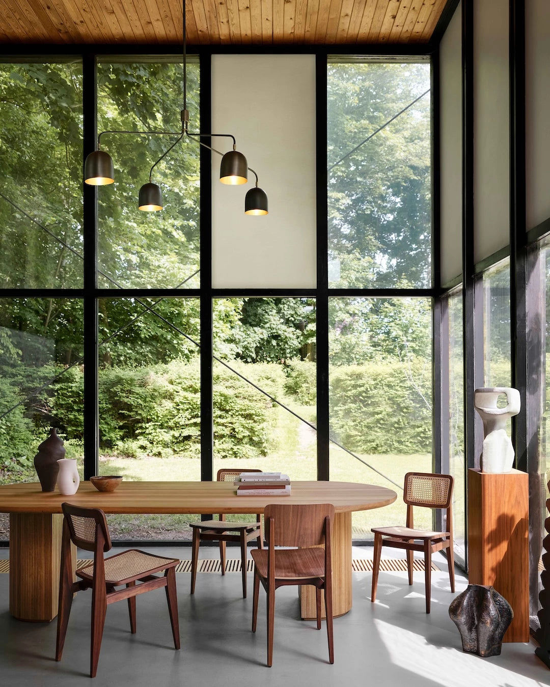 Howard Chandelier 6 Arm by GUBI shown in an interior setting, view 3