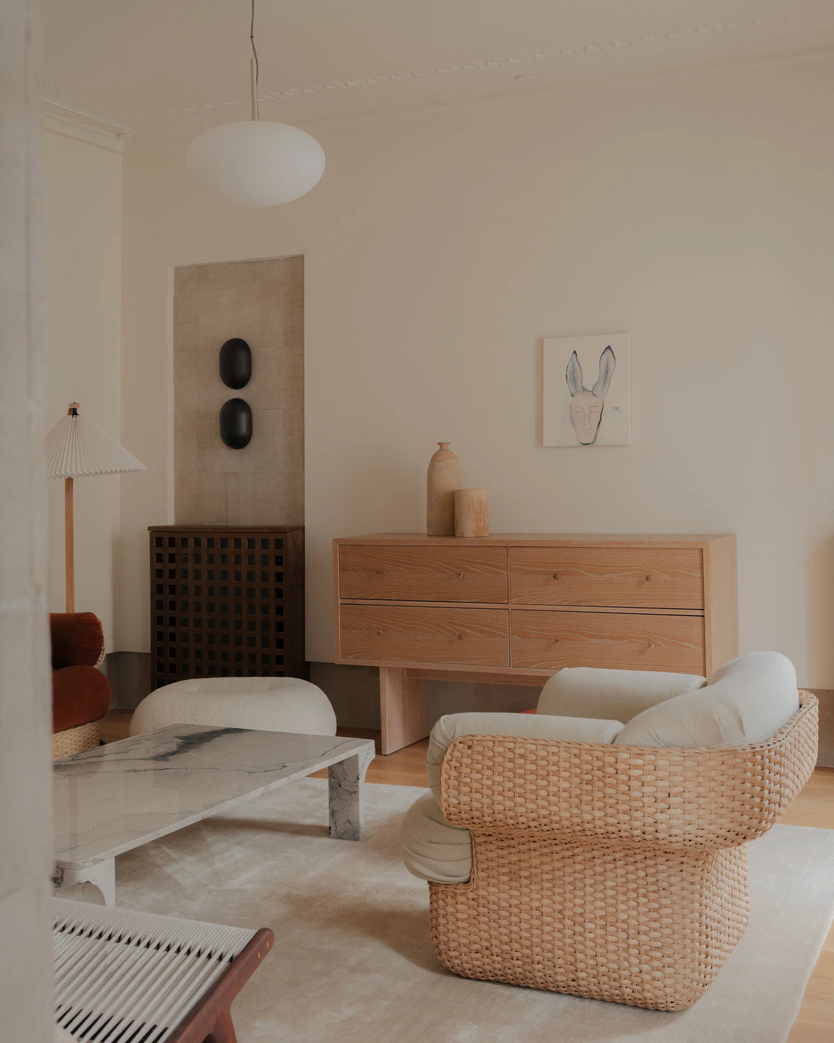 Howard Wall Lamp by GUBI shown in an interior setting, view 2