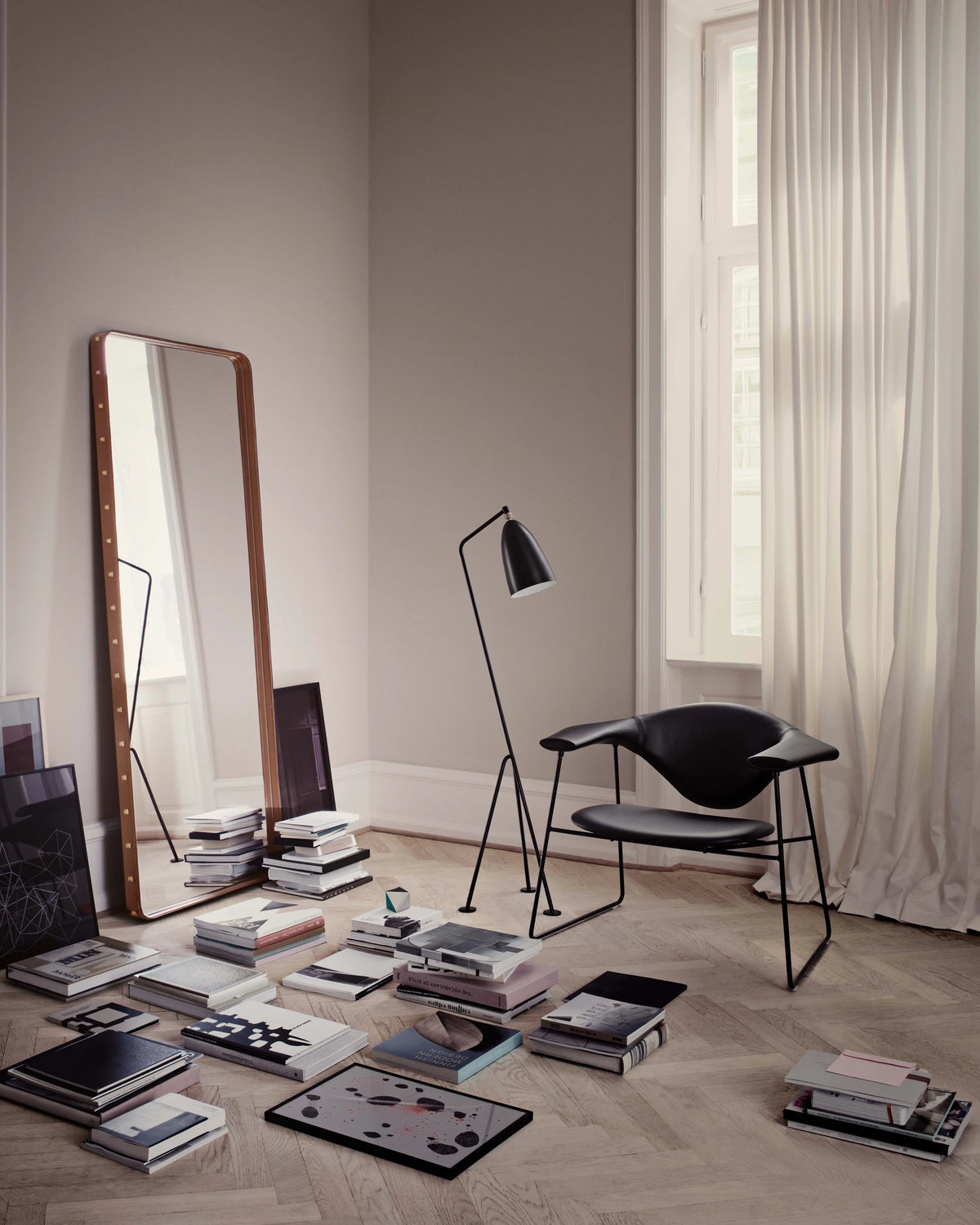 Masculo Lounge Chair by GUBI shown in an interior setting, view 3