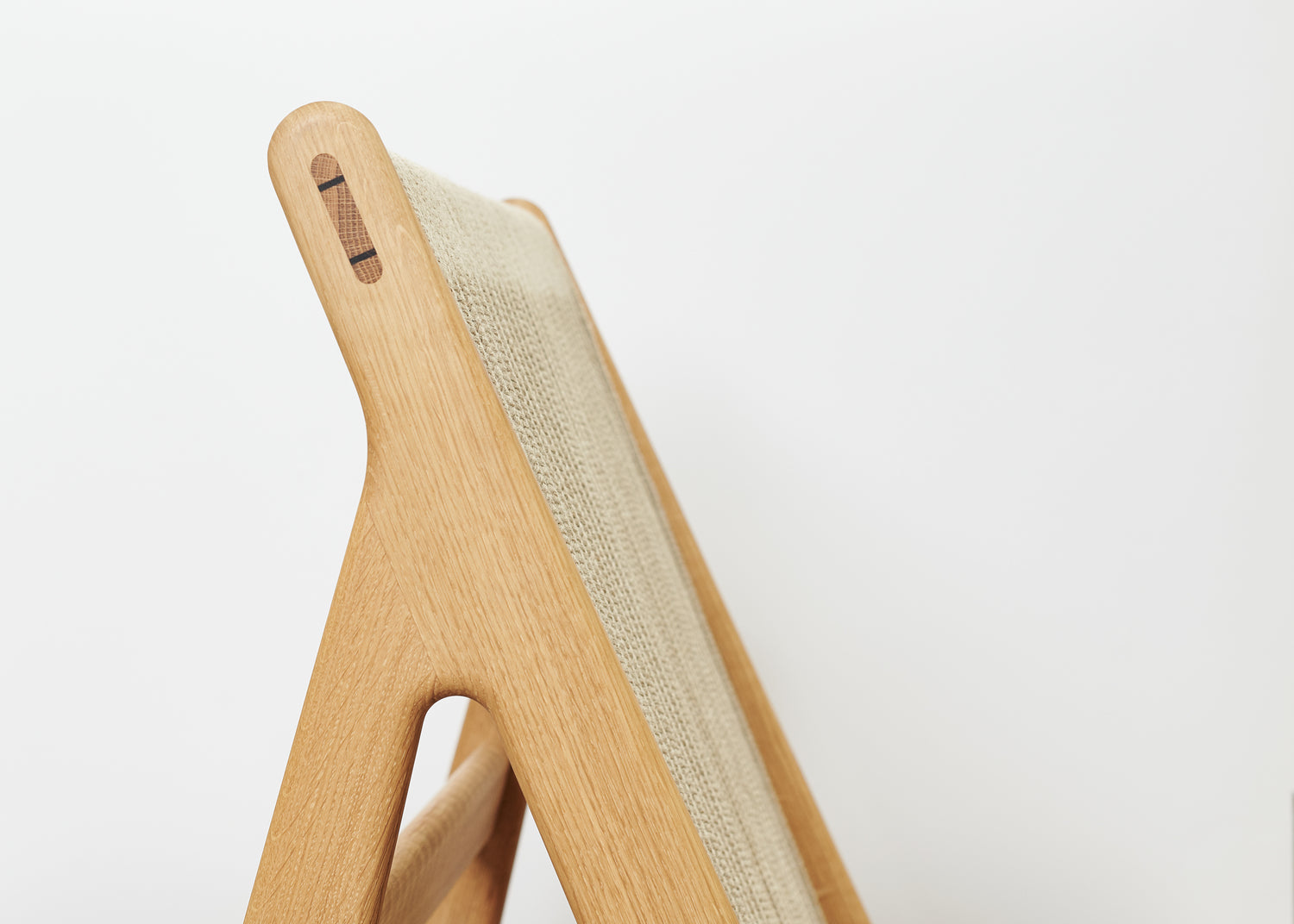 MR01 Initial Chair by GUBI shown in an interior setting