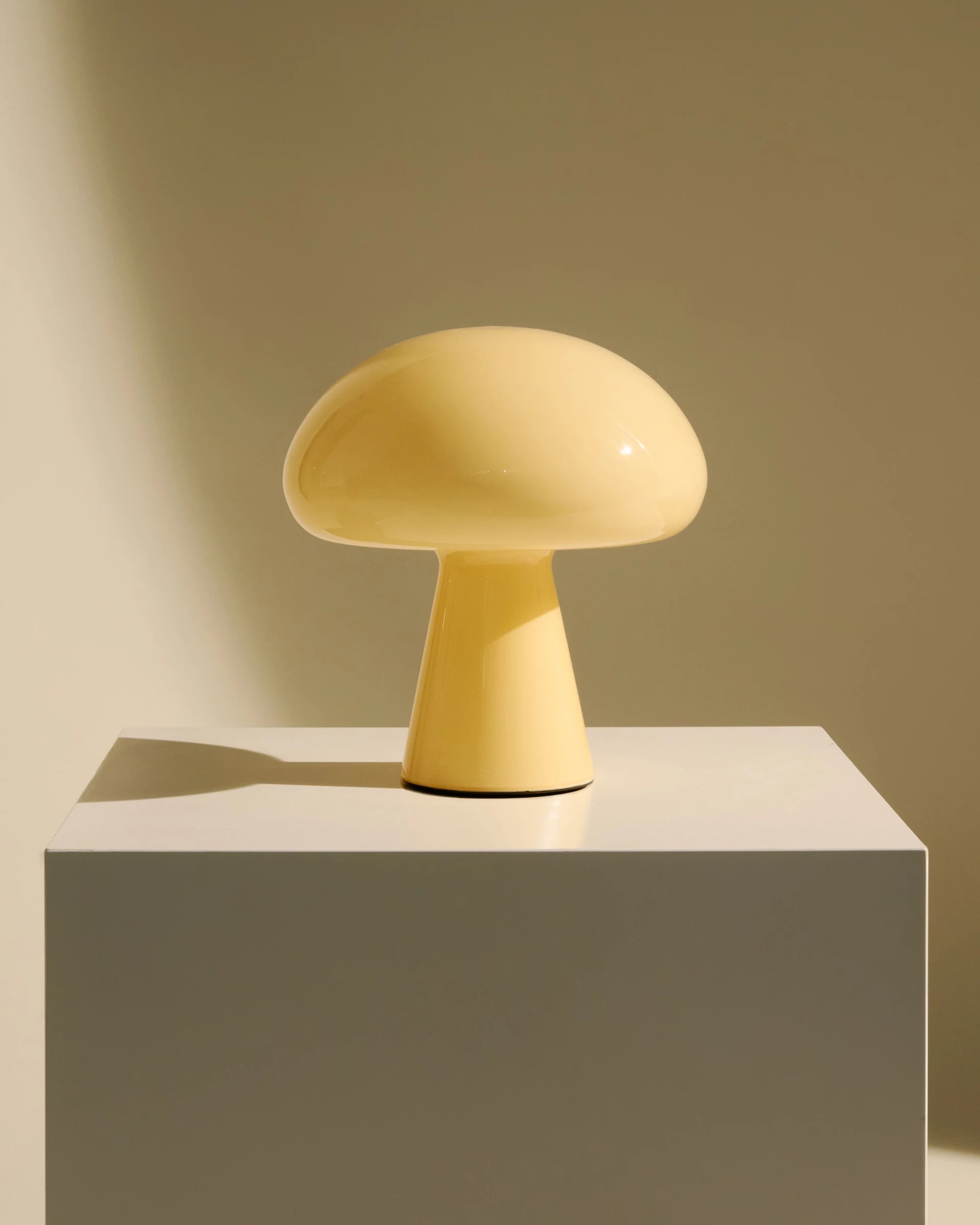 Obello Portable Lamp by GUBI shown in an interior setting