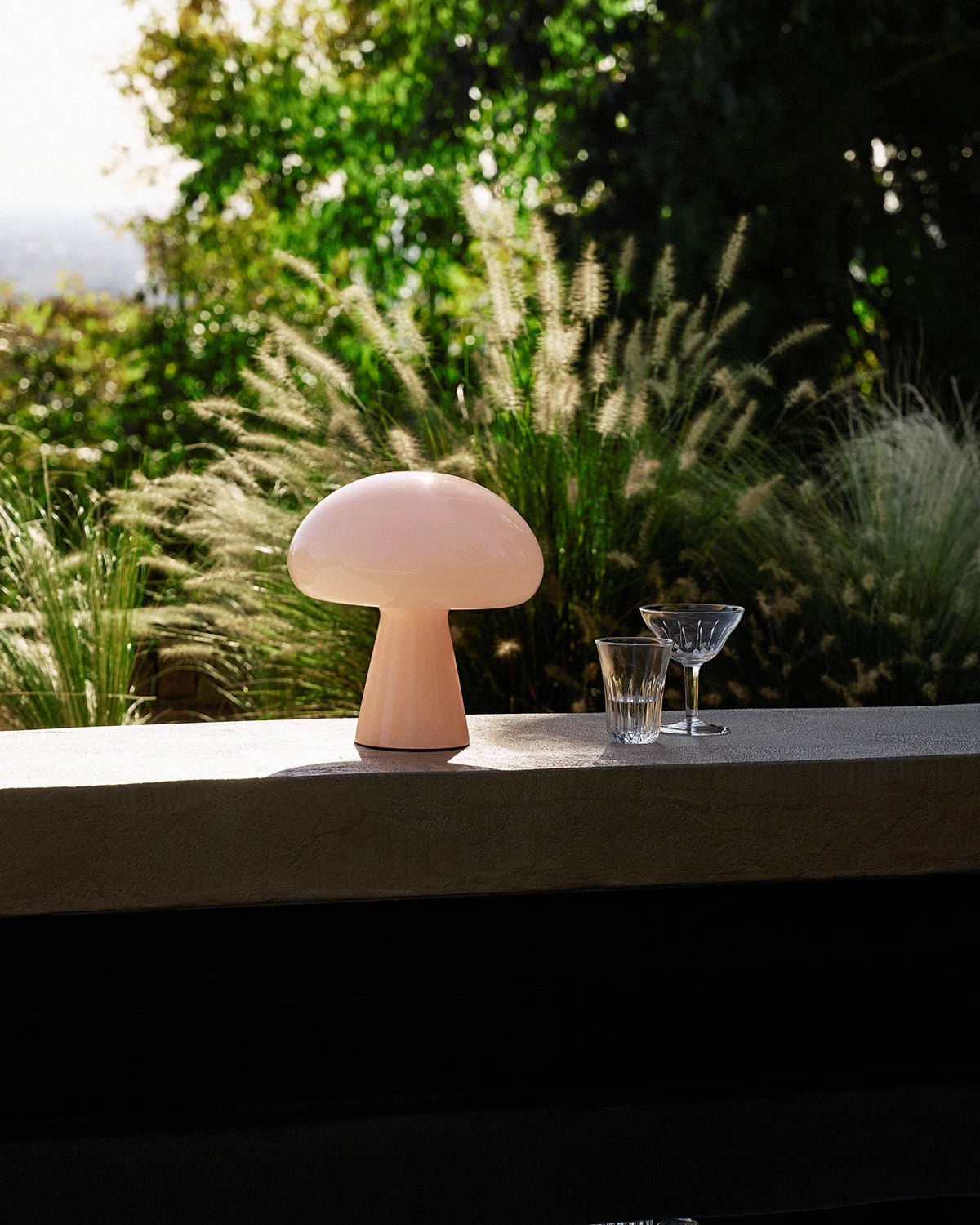 Obello Portable Lamp by GUBI shown in an interior setting, view 3