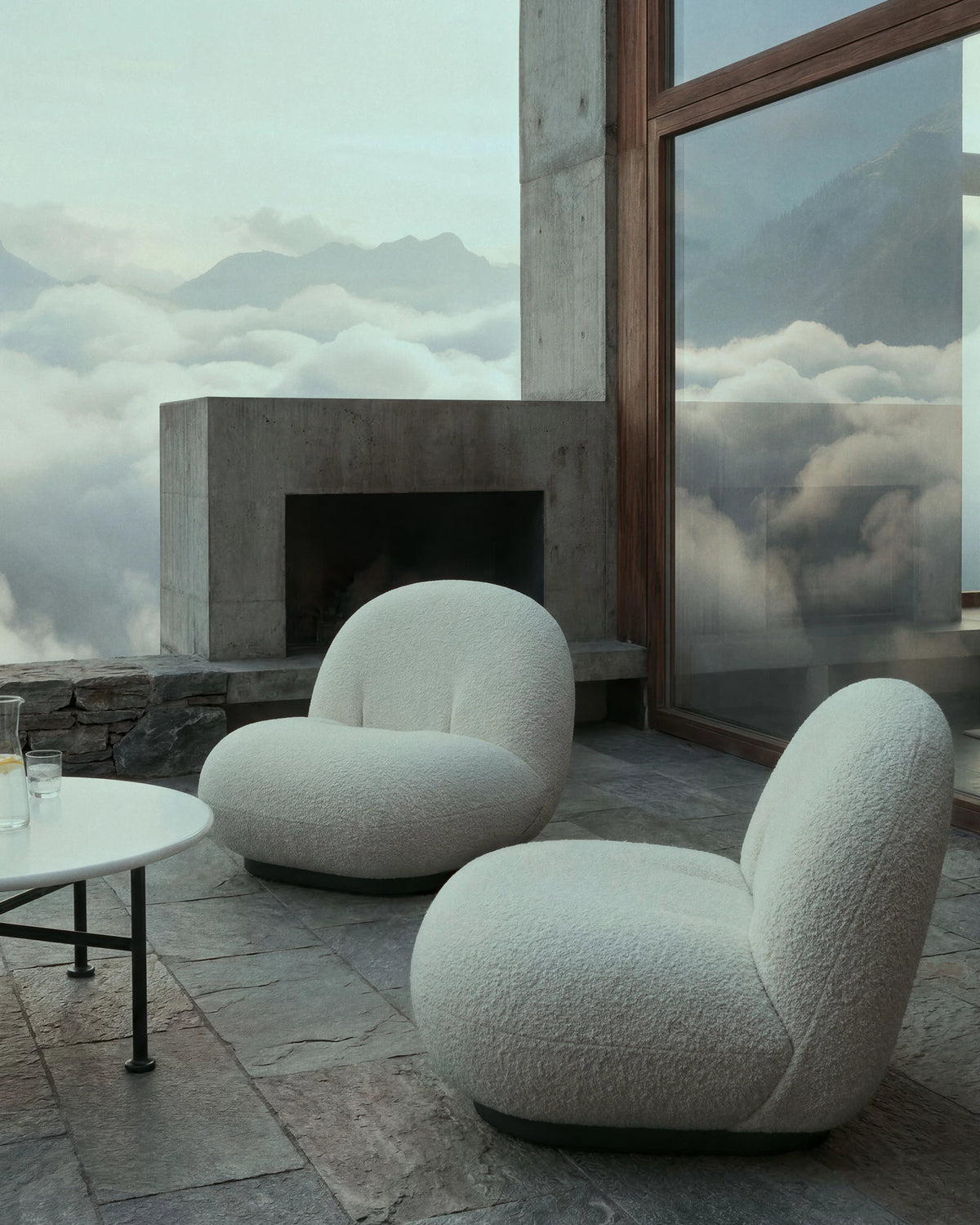 Pacha Lounge Chair by GUBI shown in an interior setting, view 2