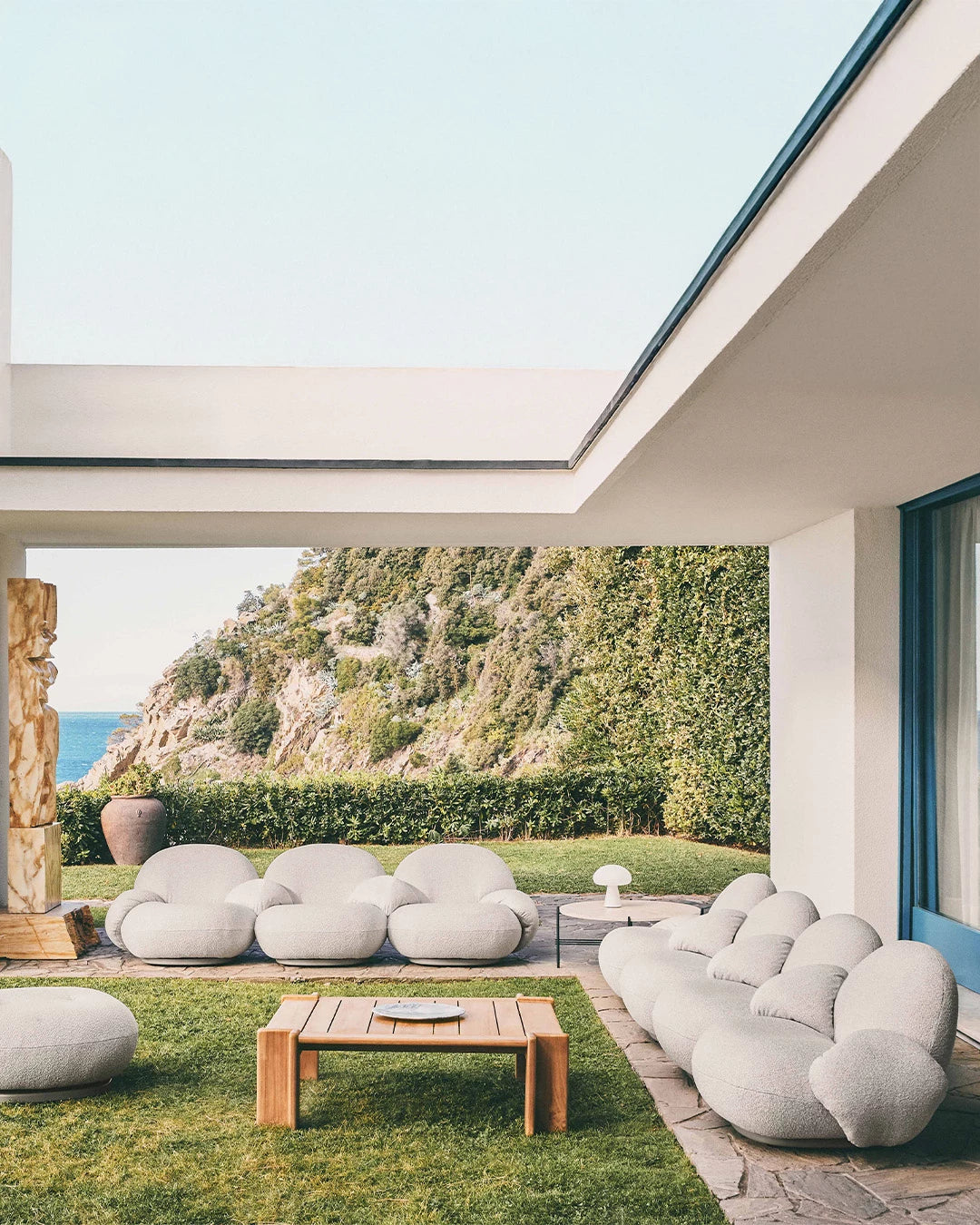 Pacha Outdoor Ottoman Cover by GUBI shown in an interior setting, view 2
