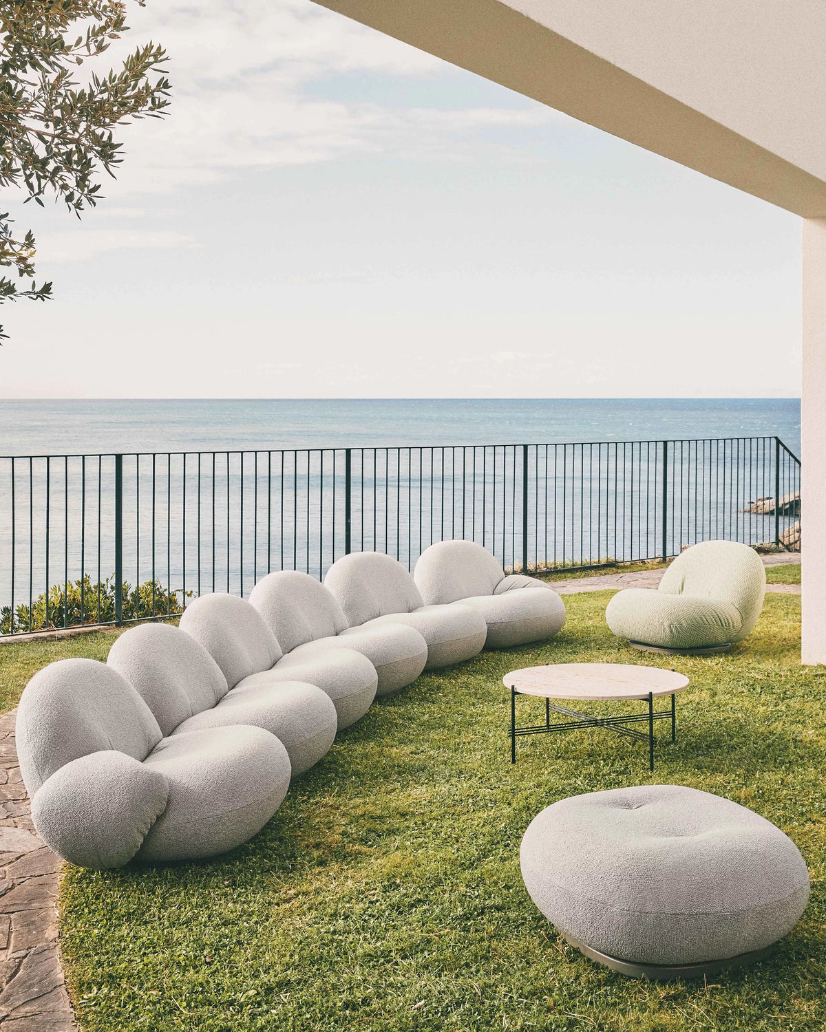 Pacha Outdoor Ottoman Cover by GUBI shown in an interior setting, view 3