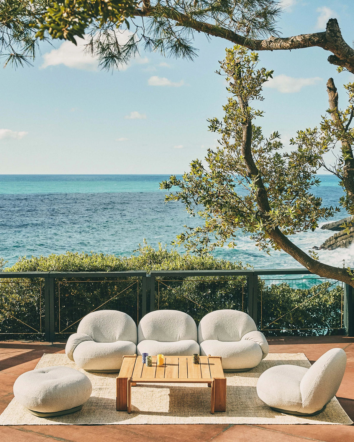 Pacha Outdoor Ottoman Cover by GUBI shown in an interior setting, view 4