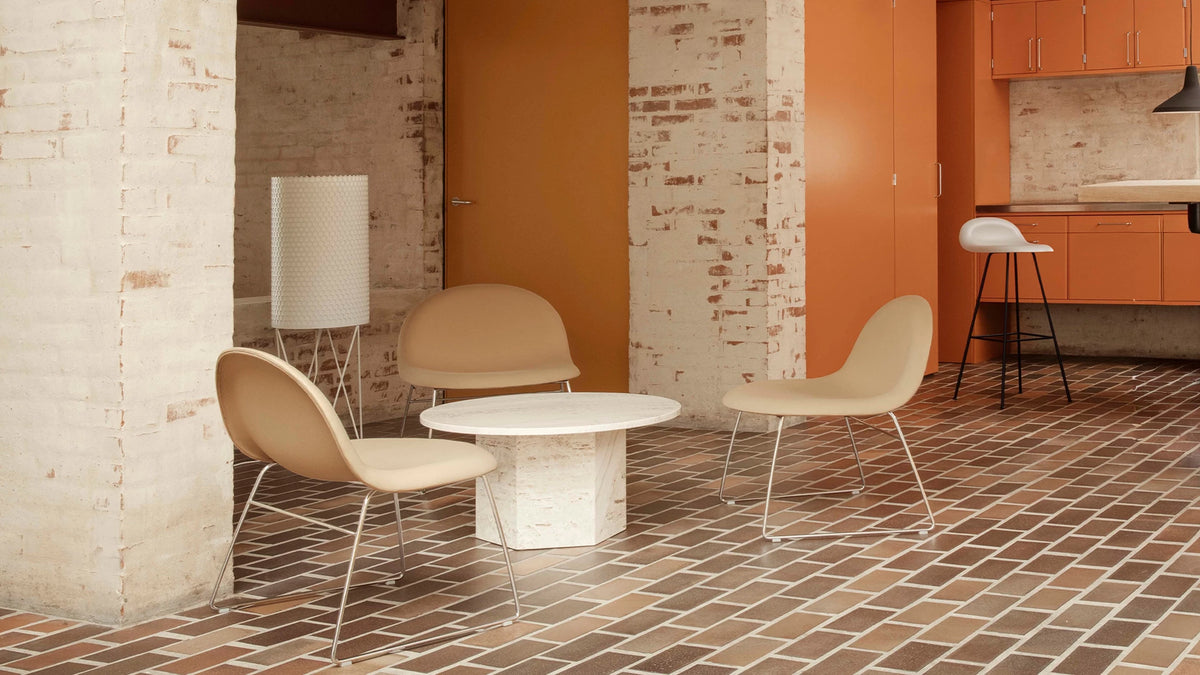 PD2 Floor Lamp by GUBI shown in an interior setting, view 1