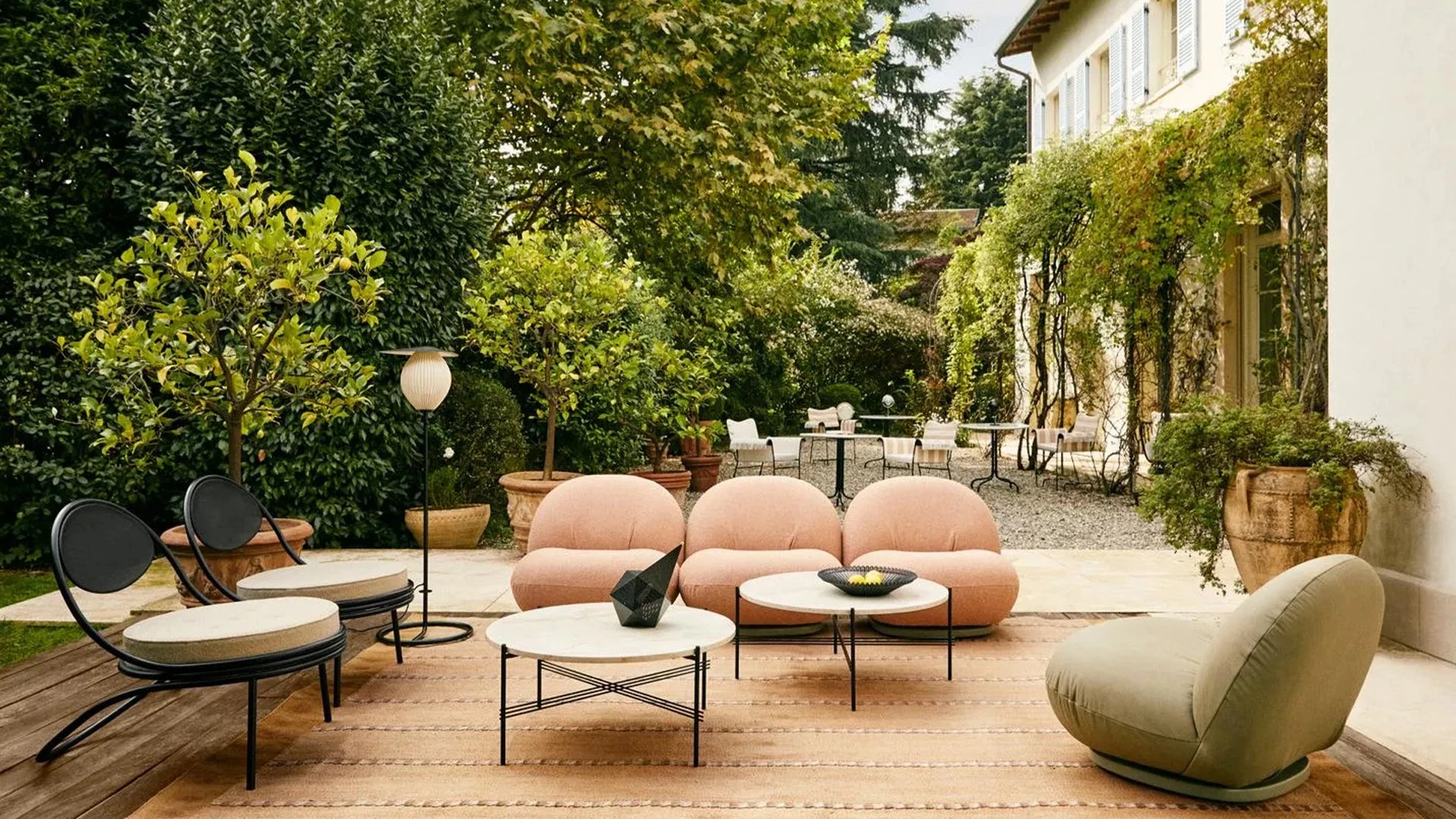 Satellite Outdoor Floor Lamp by GUBI shown in an interior setting, view 1