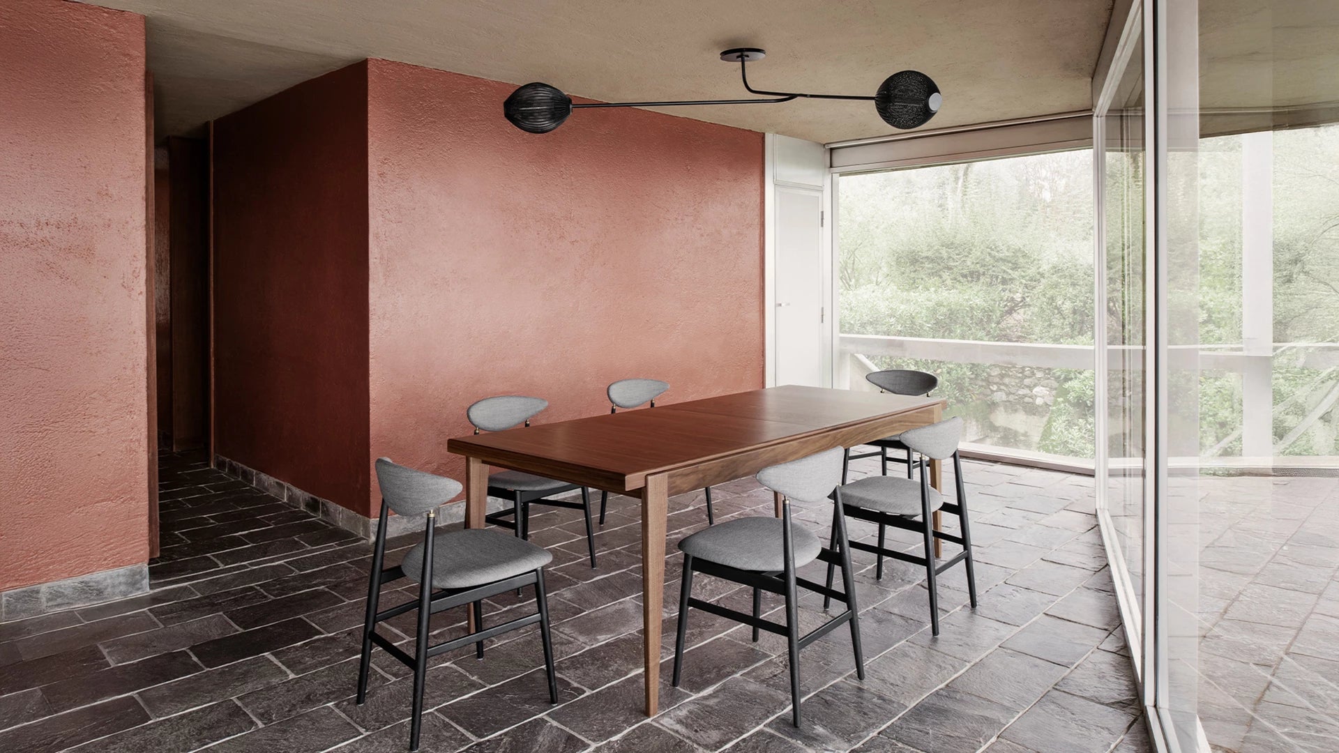 Satellite Wall Lamp by GUBI shown in an interior setting
