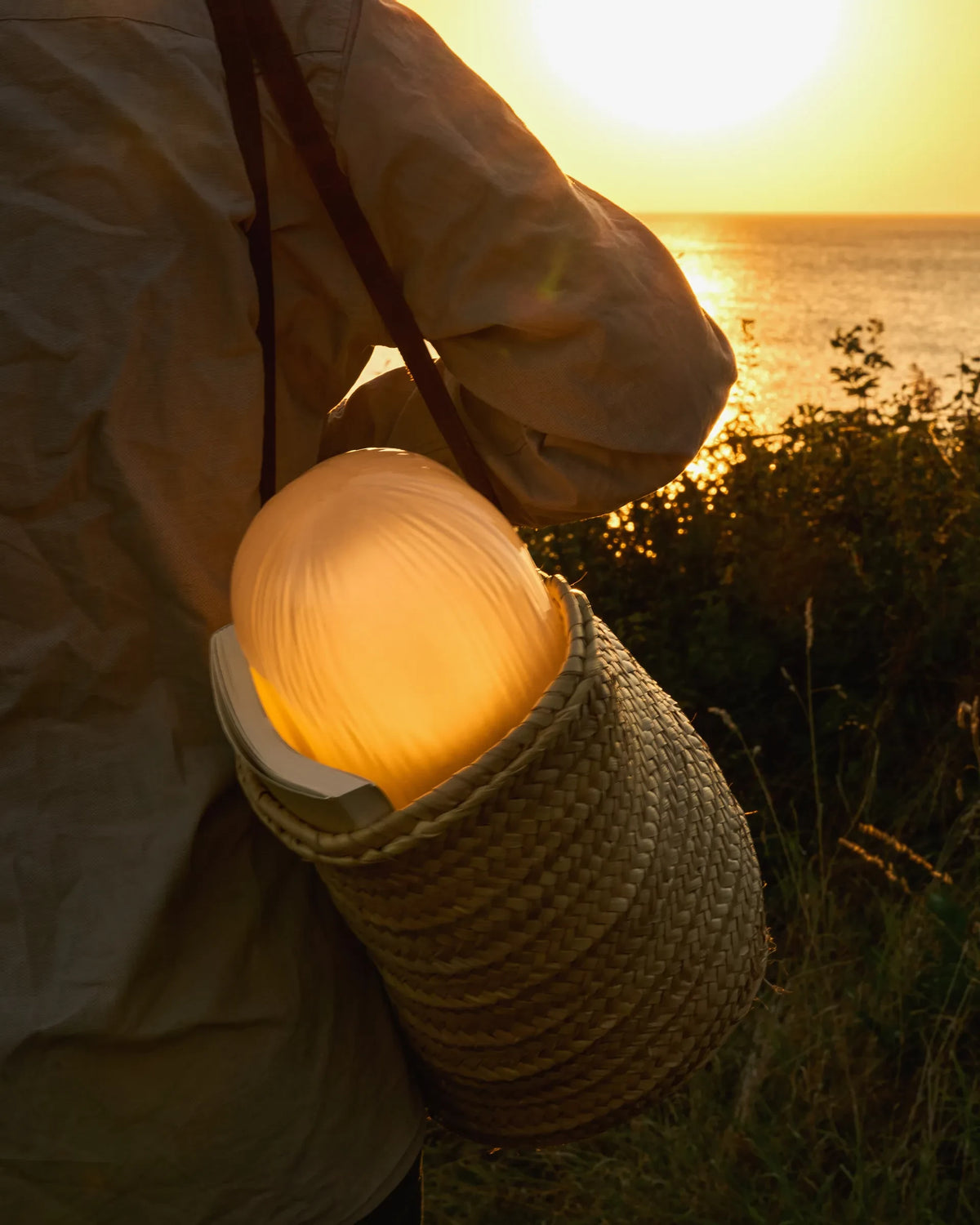 Seine Portable Lamp by GUBI shown in an interior setting, view 1