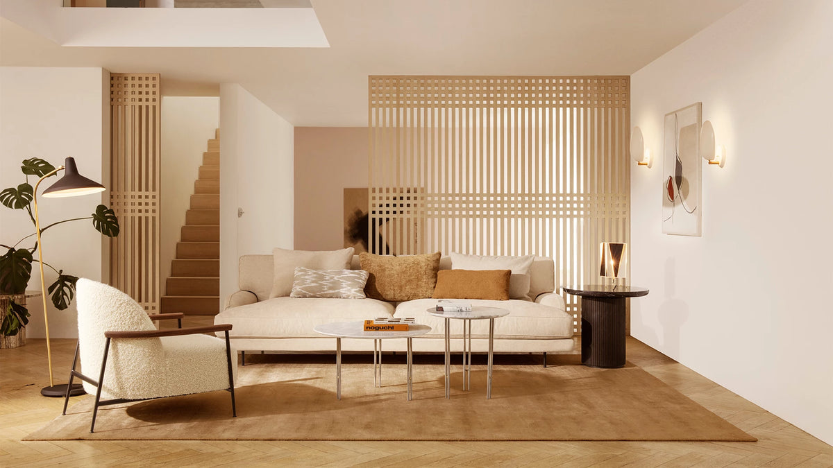 Sejour Lounge Chair by GUBI shown in an interior setting, view 1