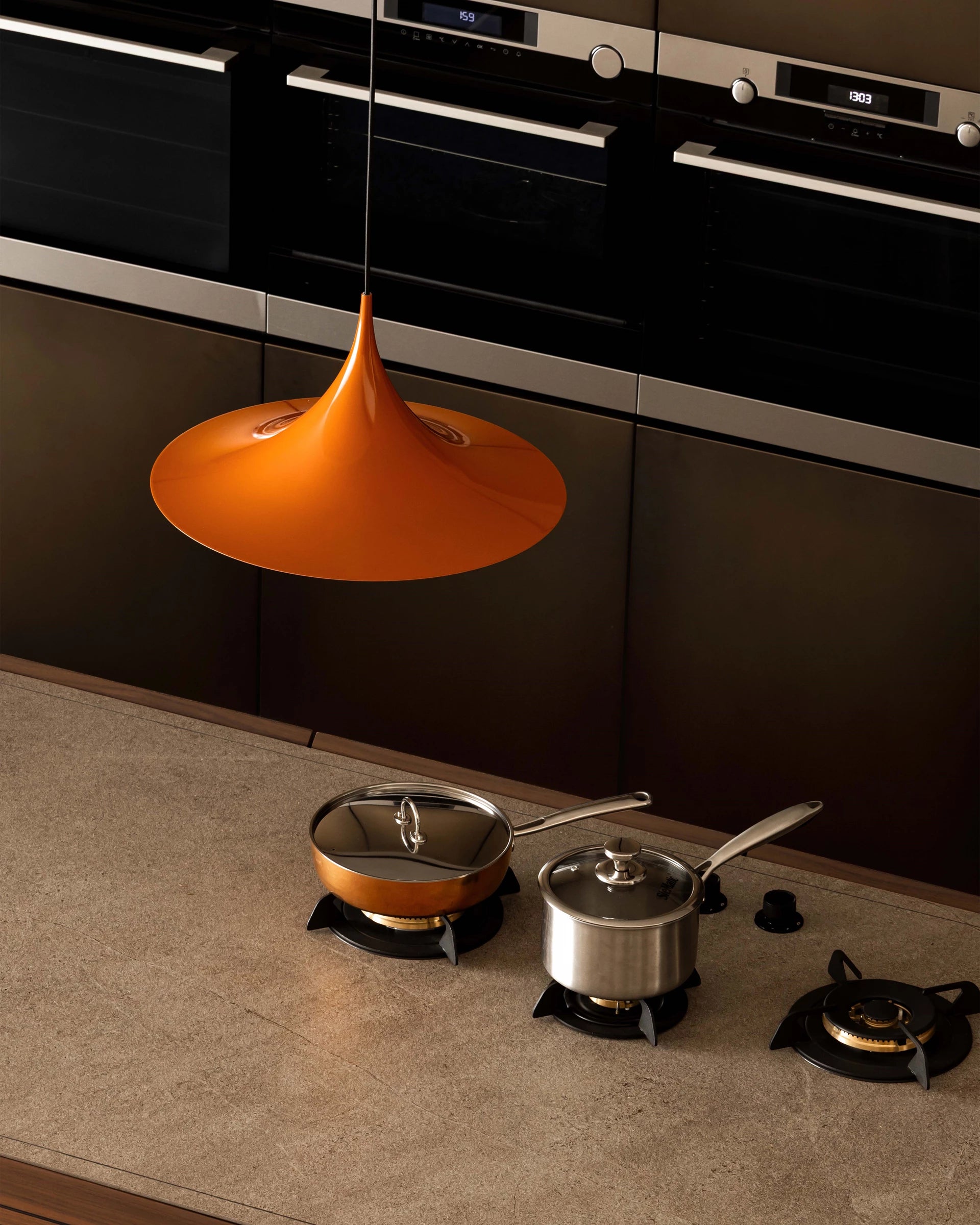 Semi Pendant by GUBI shown in an interior setting