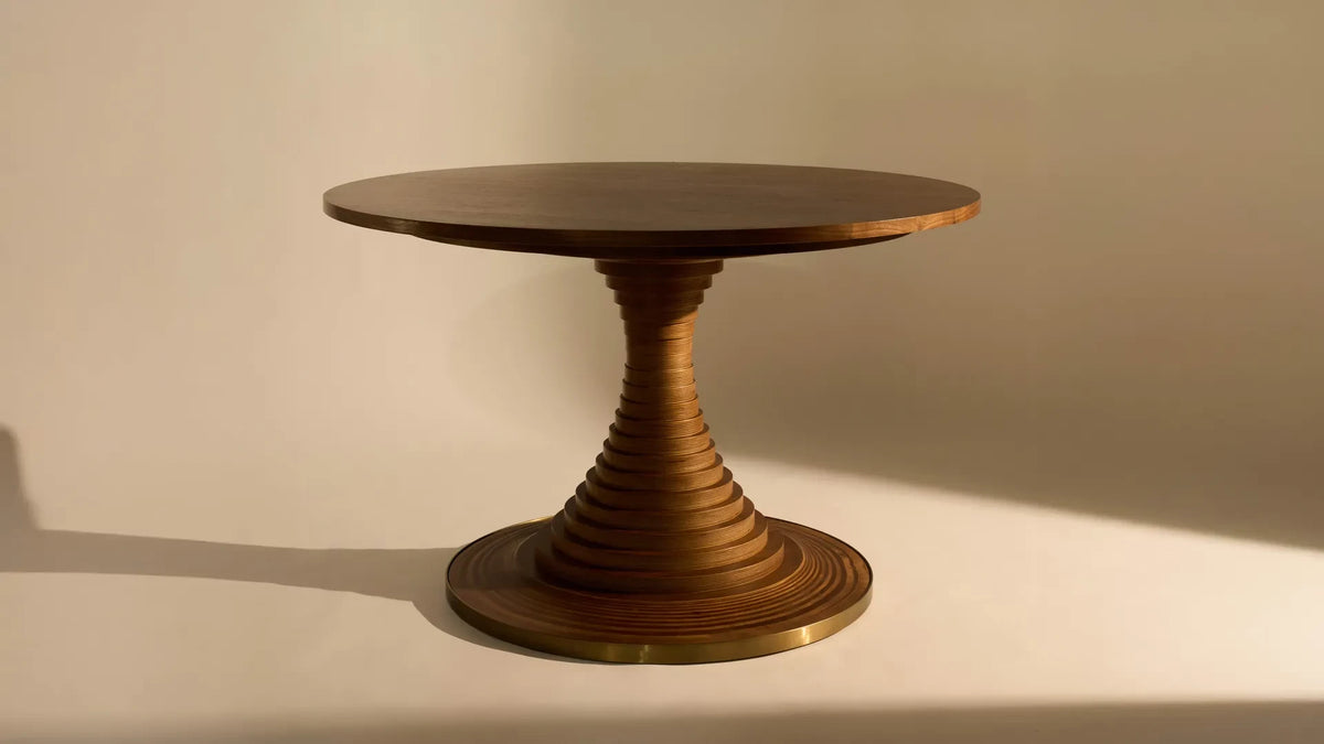 Tavolo a Dischi Dining Table by GUBI shown in an interior setting
