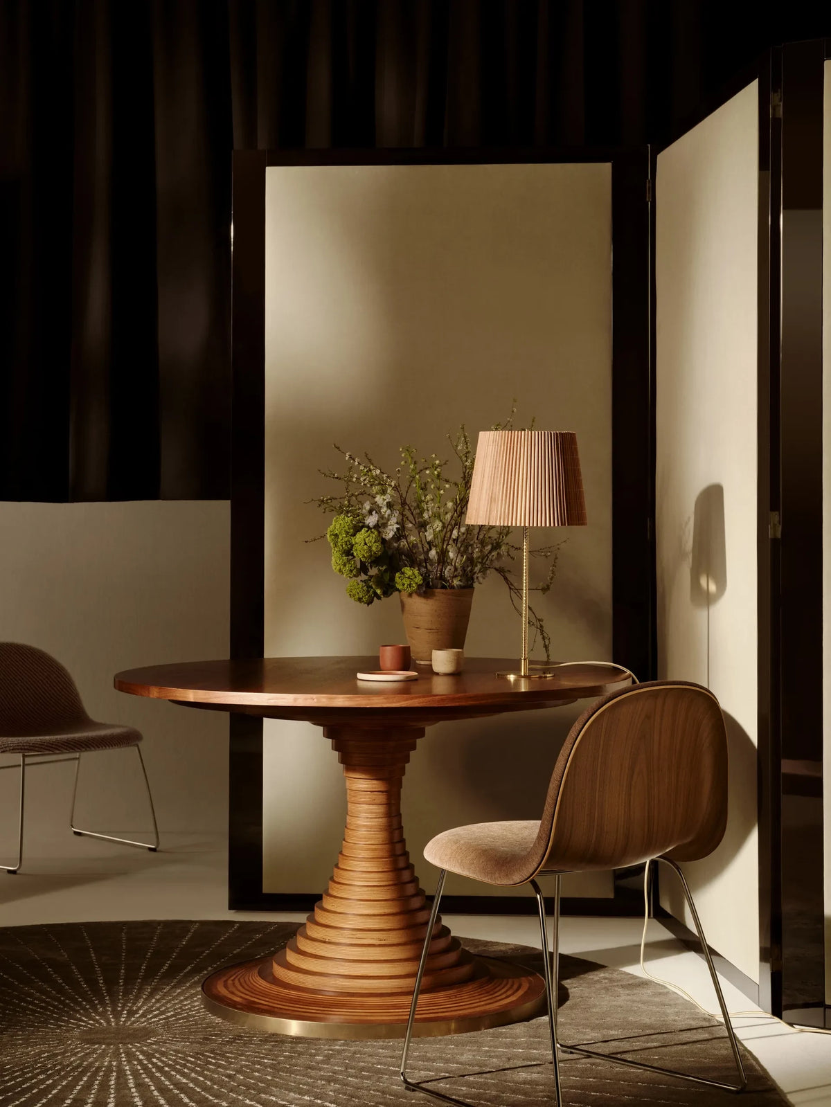 Tavolo a Dischi Dining Table by GUBI shown in an interior setting, view 3