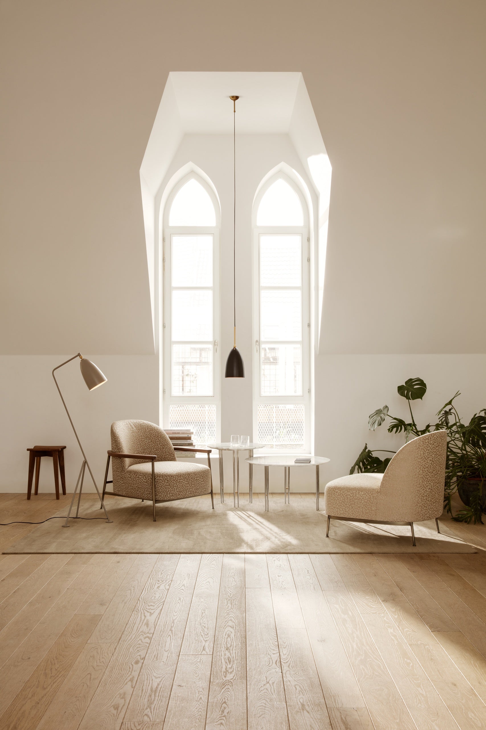 Trèfle Stool by GUBI shown in an interior setting