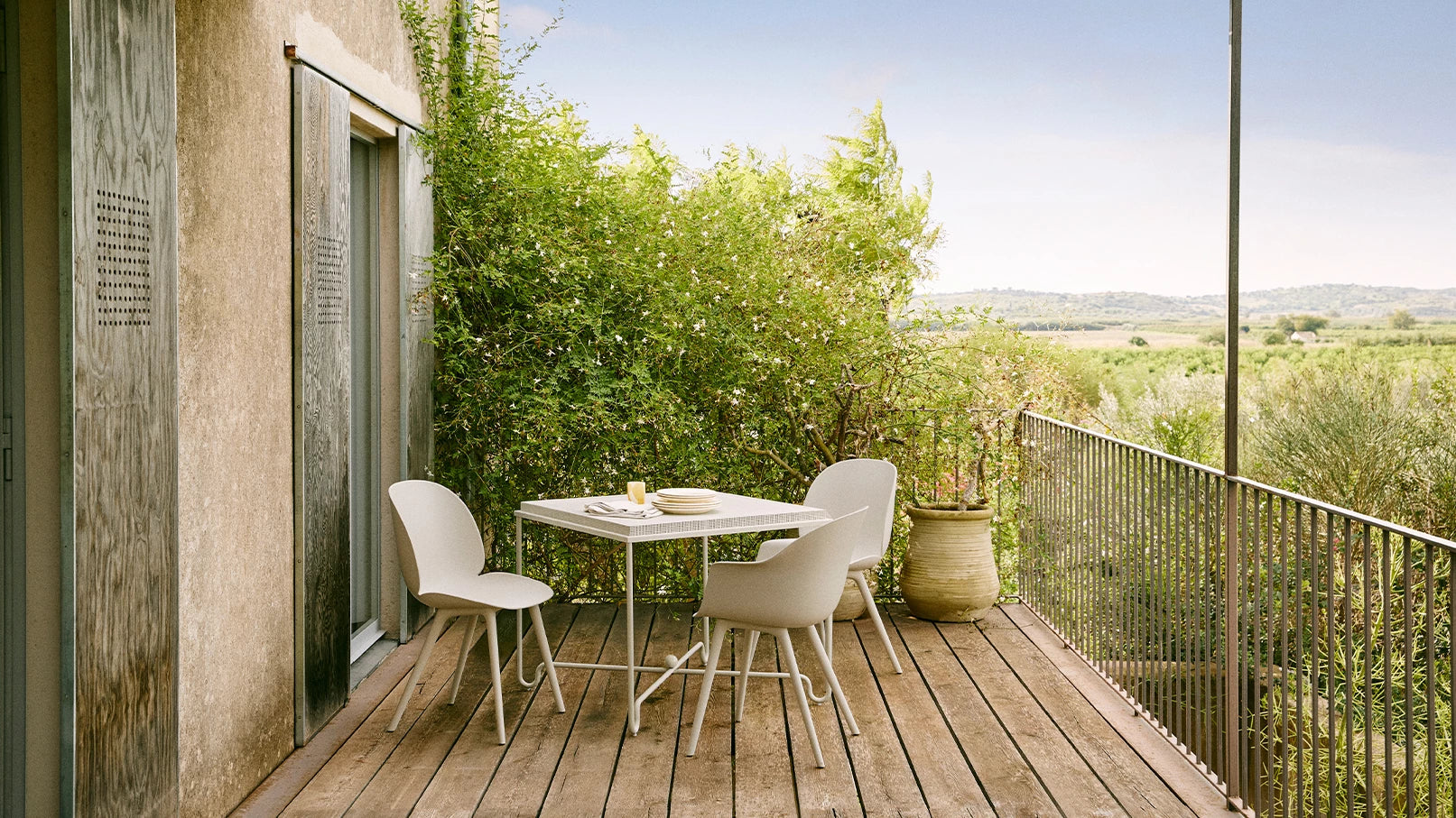 Tropique Dining Table by GUBI shown in an interior setting, view 1