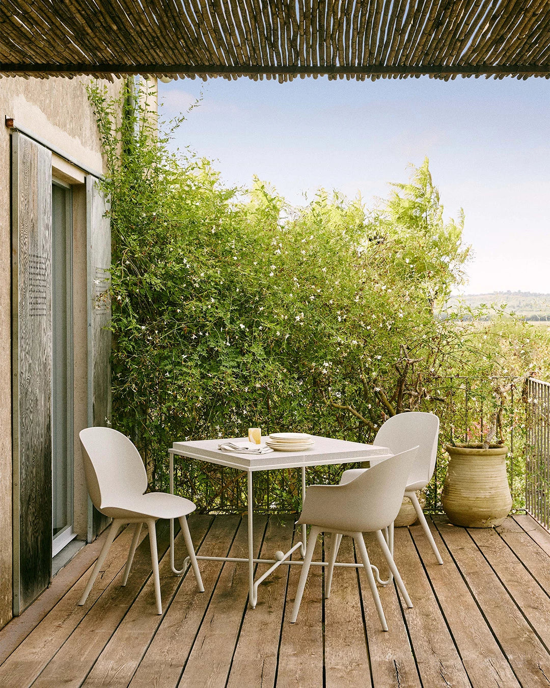 Tropique Dining Table by GUBI shown in an interior setting, view 2