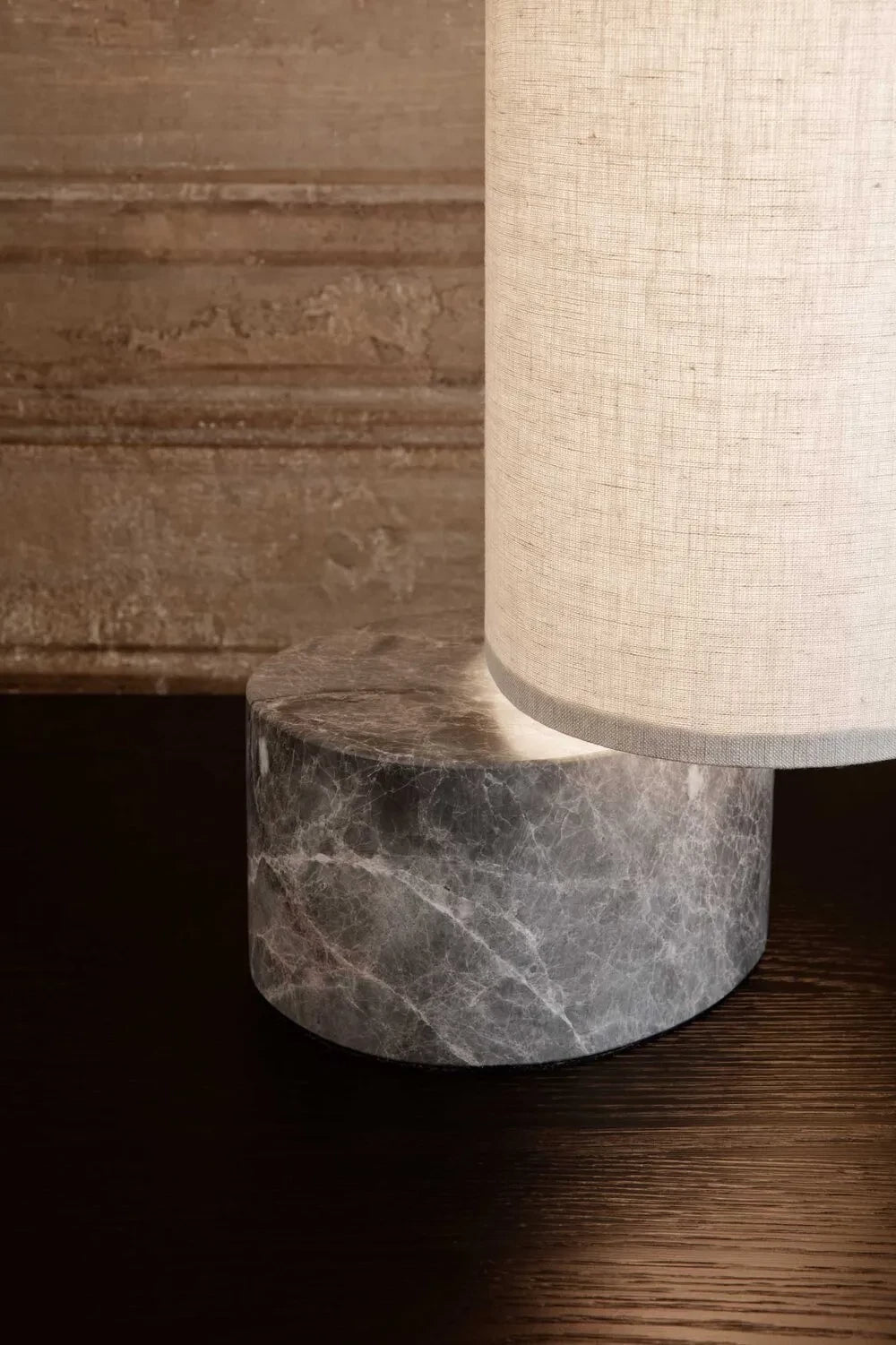 Unbound Table Lamp by GUBI shown in an interior setting